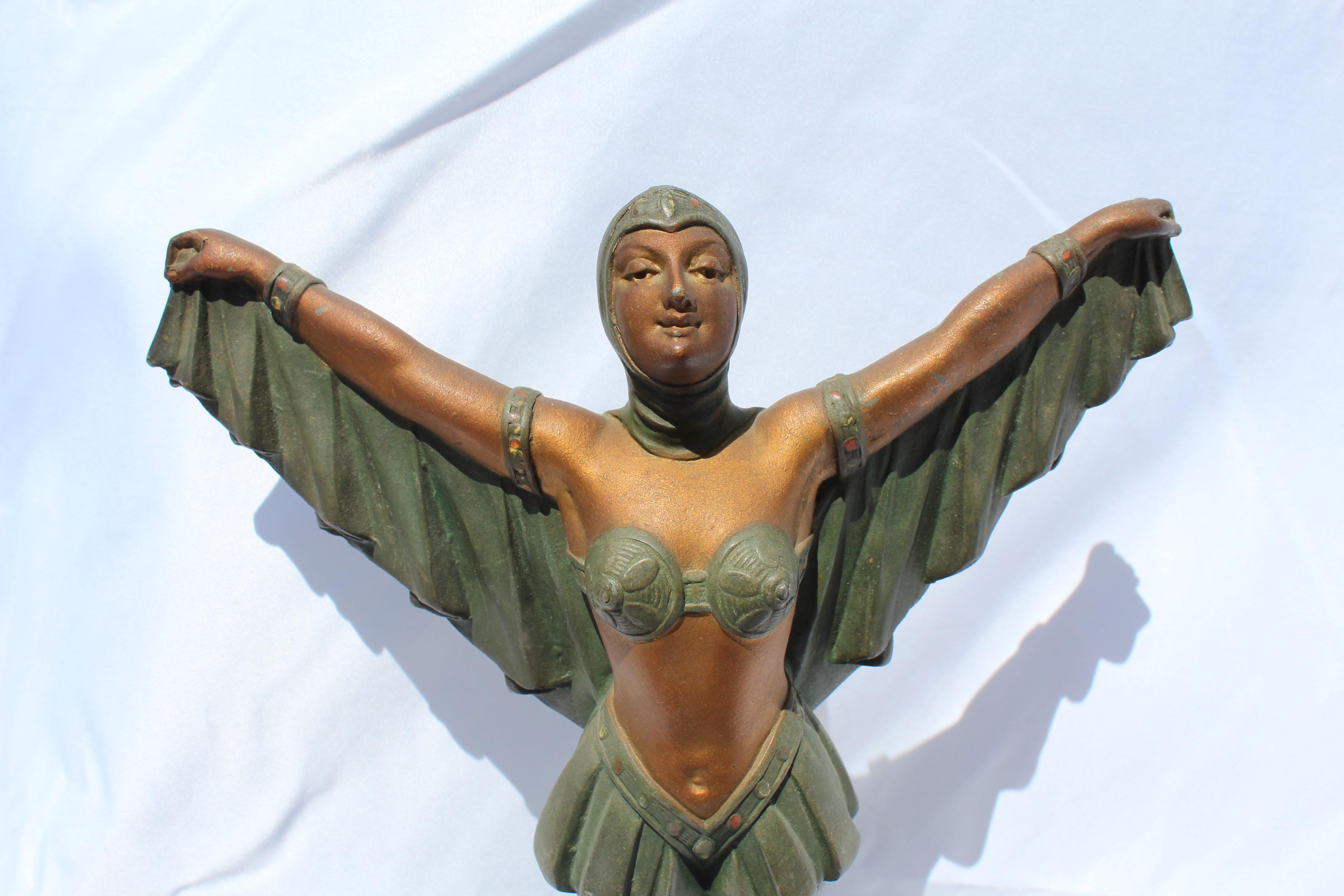 Art Deco bat girl with original patina finish. Mounted on black/fold marble base. Has the (France) casting mark on the back side of her arm. From a private collector. Measures: Height is 11 