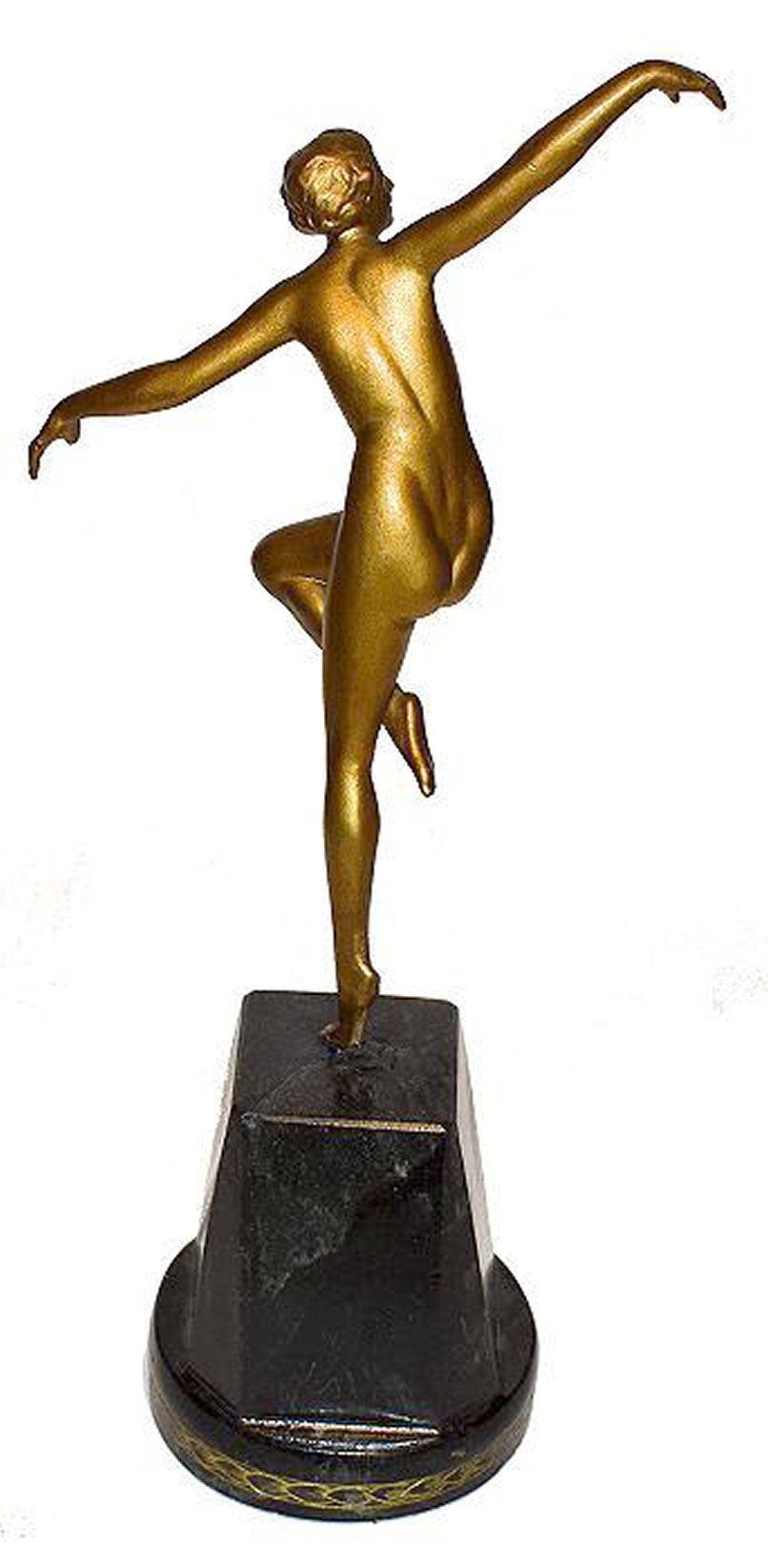 Very graceful and totally authentic 1930s Art Deco cold painted spelter figure on a black marble base. She stands on her plinth a full 33cm tall, so a great size. With her arms span the total width is 18cms. Stunning to adorn any room to emit