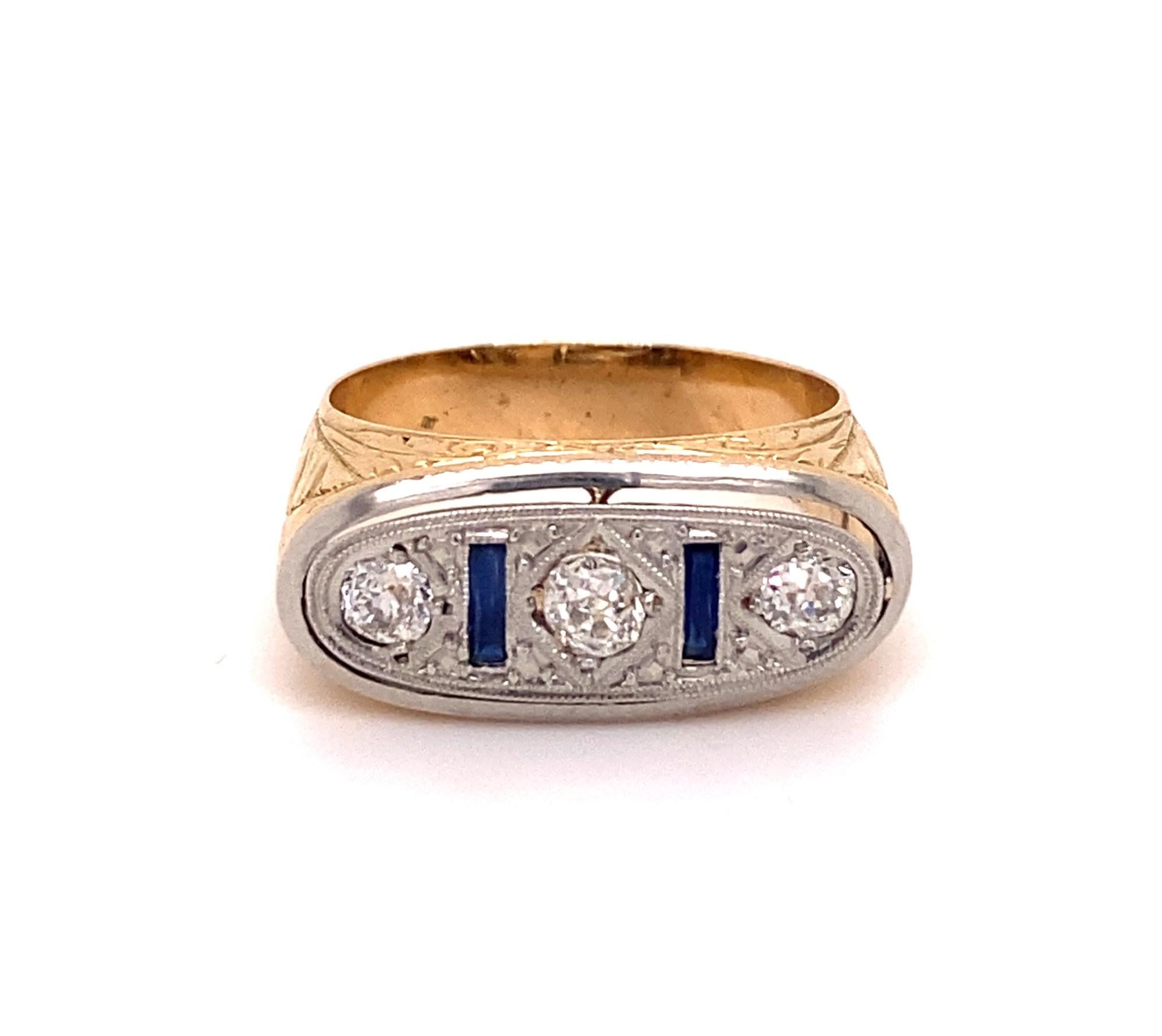 This is a beautiful original art deco Men's ring with detailed foliate designs. The ring is set with three old mine cut diamonds and two natural French cut sapphires. Diamonds have a total weight of .55 carats I color SI-1 clarity set in platinum.