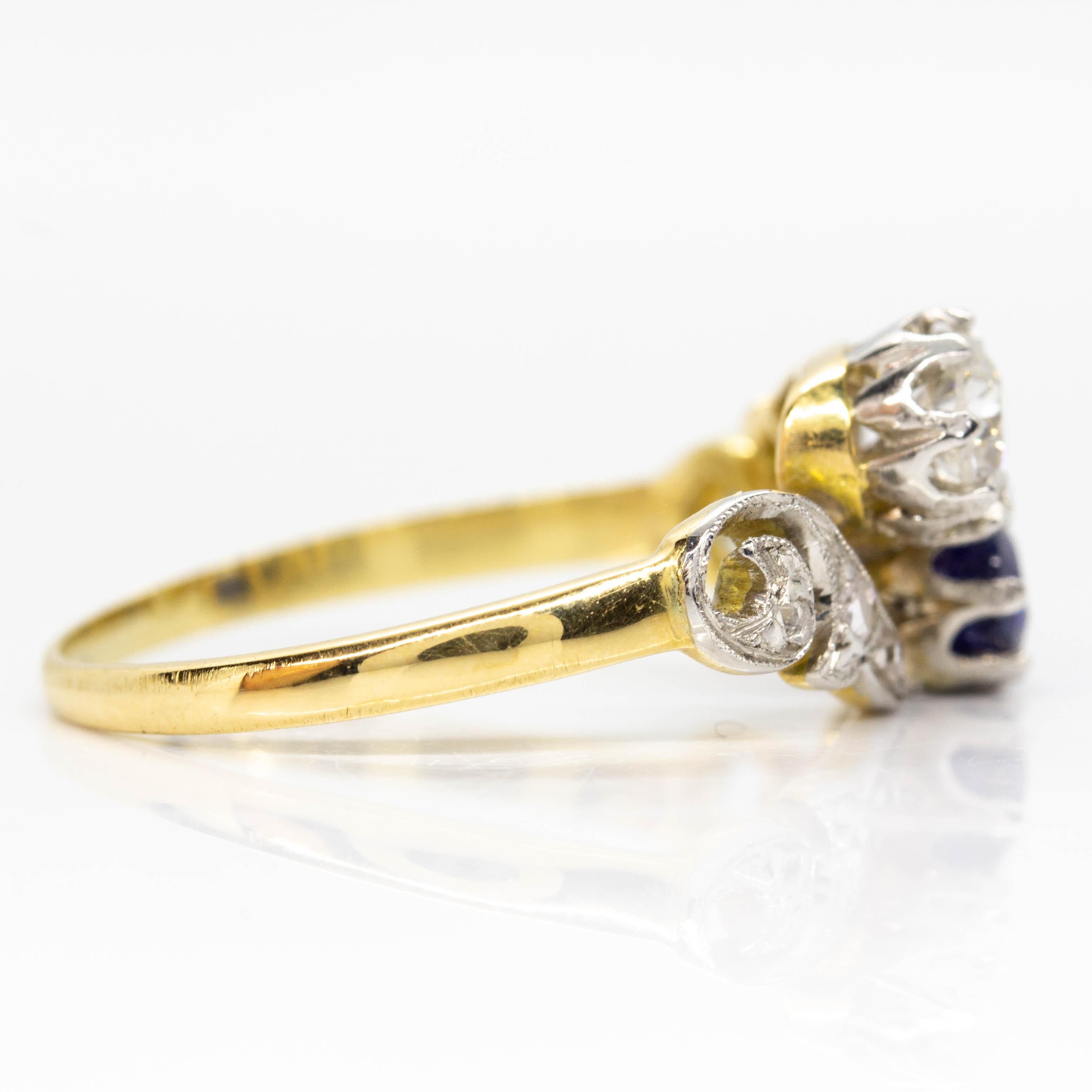 Period: Art Nouveau (1890-1919)
Composition: 18K Gold and Platinum
•	1 old mine cut diamond H-VS2 0.30ctw.
•	1 natural oval cut sapphire 0.20ctw.
•	6 rose cut diamonds I-VS2 0.08ctw.
Ring size: 6 ½ 
Ring face measure: 10mm by 12mm
Rise above finger:
