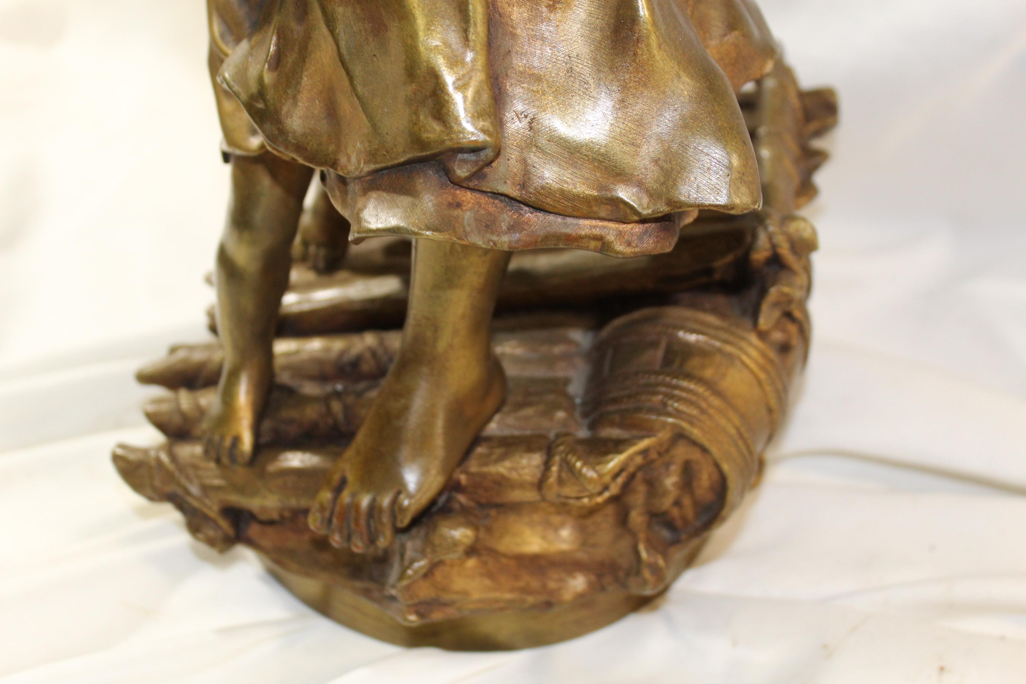 French Original Art Nouveau Bronze of a Mother and Child on a Raft   Signed For Sale