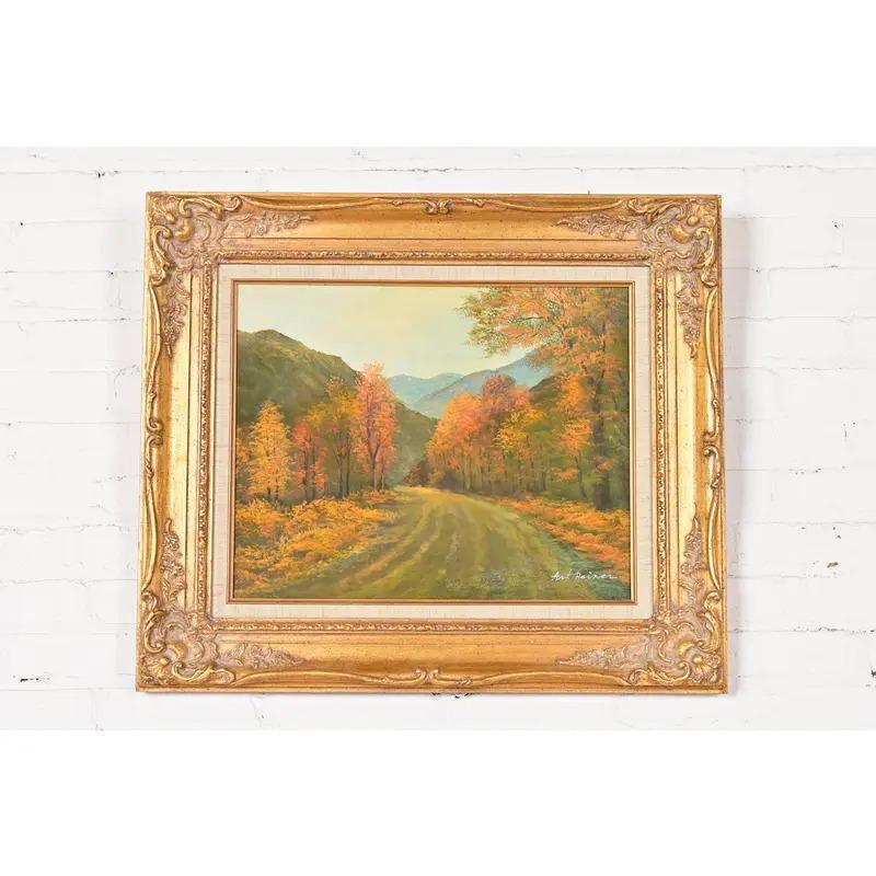Magnifique peinture à l'huile originale d'une promenade pittoresque en automne dans un cadre en bois sculpté.

Signé par l'artiste : Art Reiner

USA, Circa Mid-20th Century

Dimensions : 28,75 