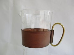 Original Aubock glass carafe with a leather cuff and brass handle