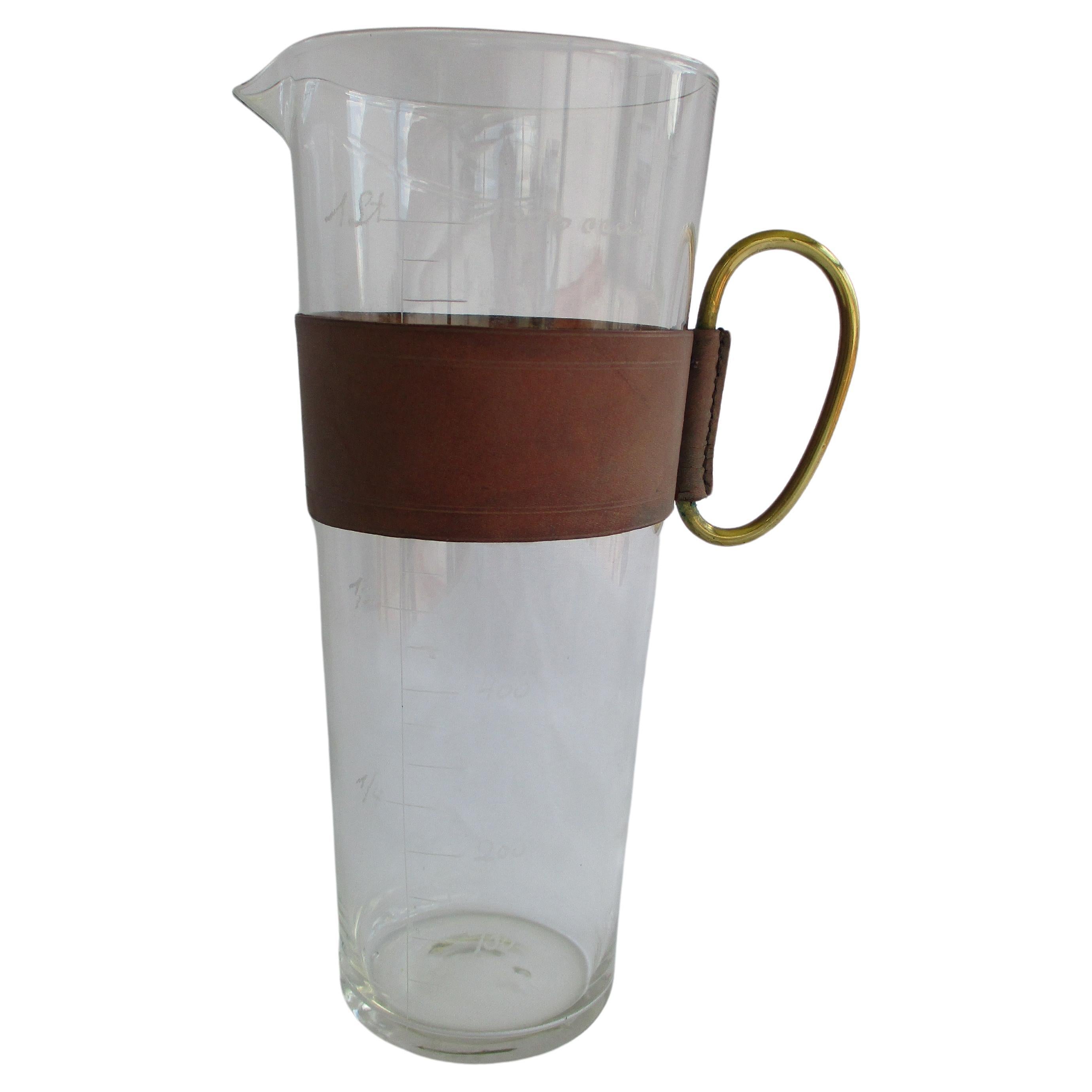 Original Aubock glass carafe with a leather cuff and brass handle For Sale