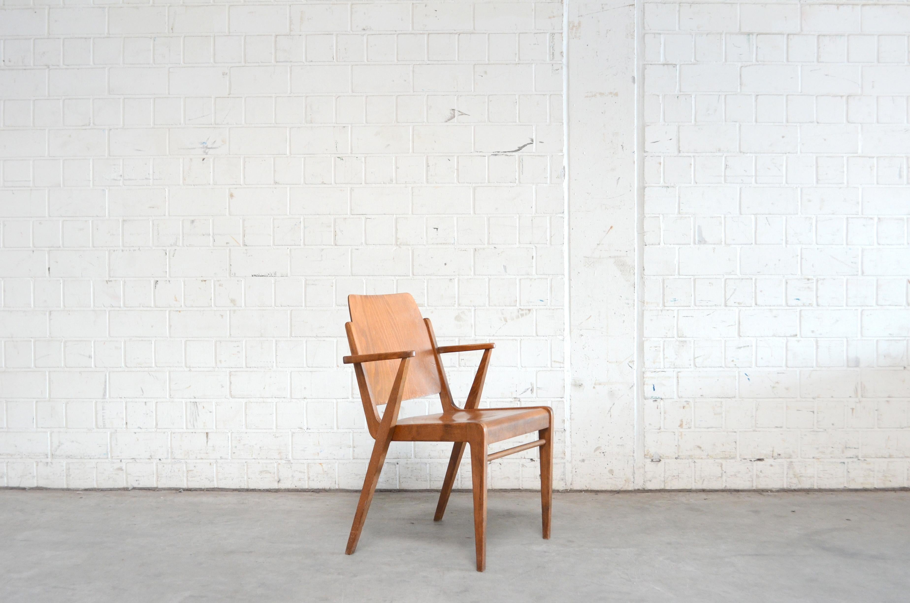 This Austro chairs are designed by Austrian architect Franz Schuster and produced by Wiesner Hager.
This version is the original vintage version with brown stained beechwood and lacquer finish.
With signs of use and vintage condition.
 