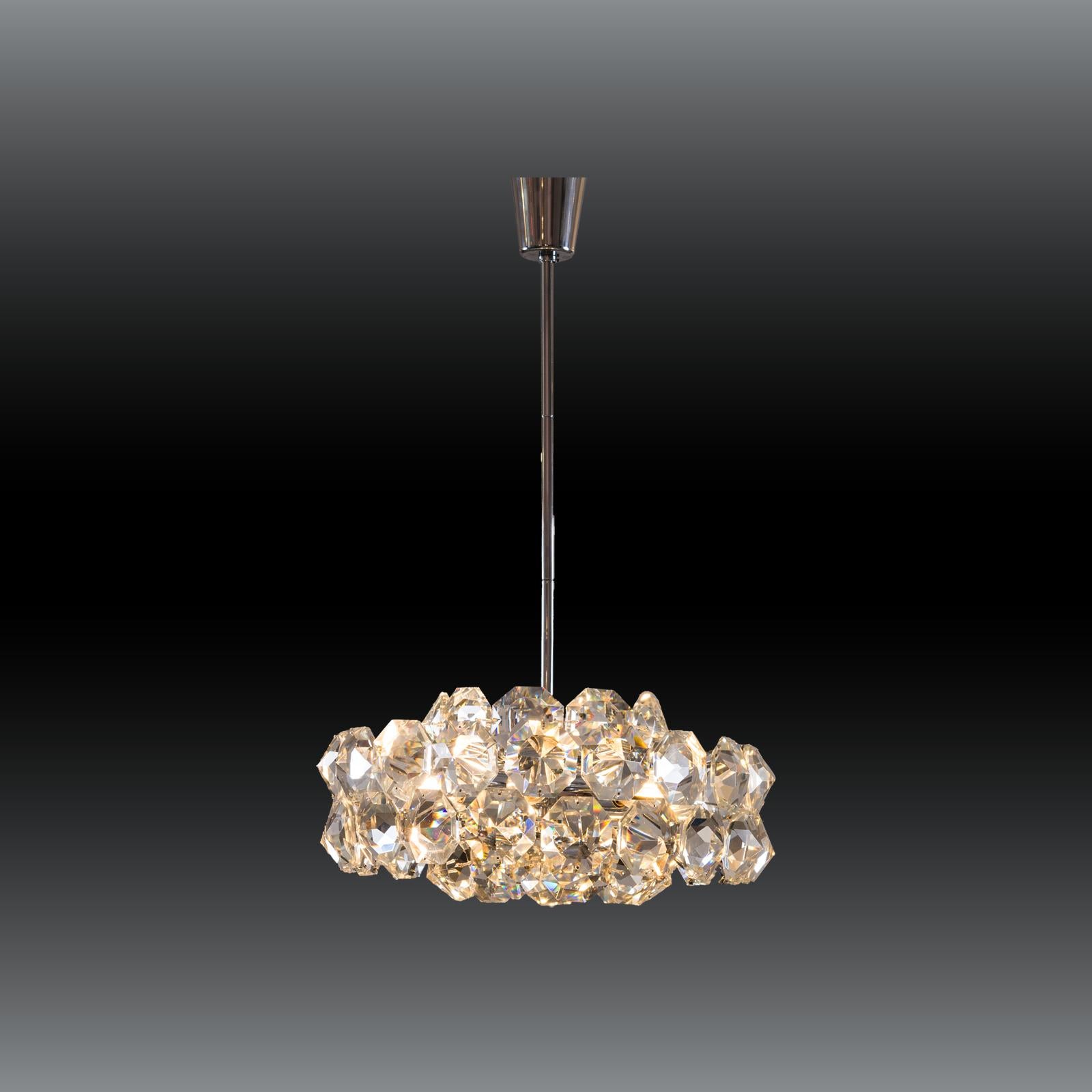 A beautiful middle-size chandelier with more than 50 handcut glass-stones.