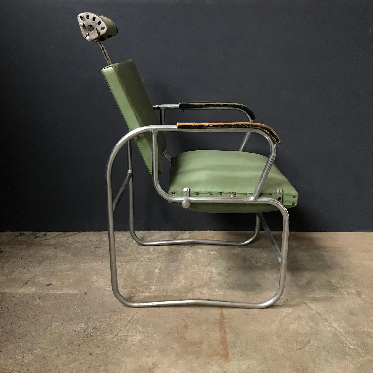 Barber chair. This beautiful authentic chair has many interesting details. The headrest is adjustable in height and angle as well as the angle of the backrest is adjustable. The seat can be rotated and fixed 180'C (360'C). The chair shows traces of