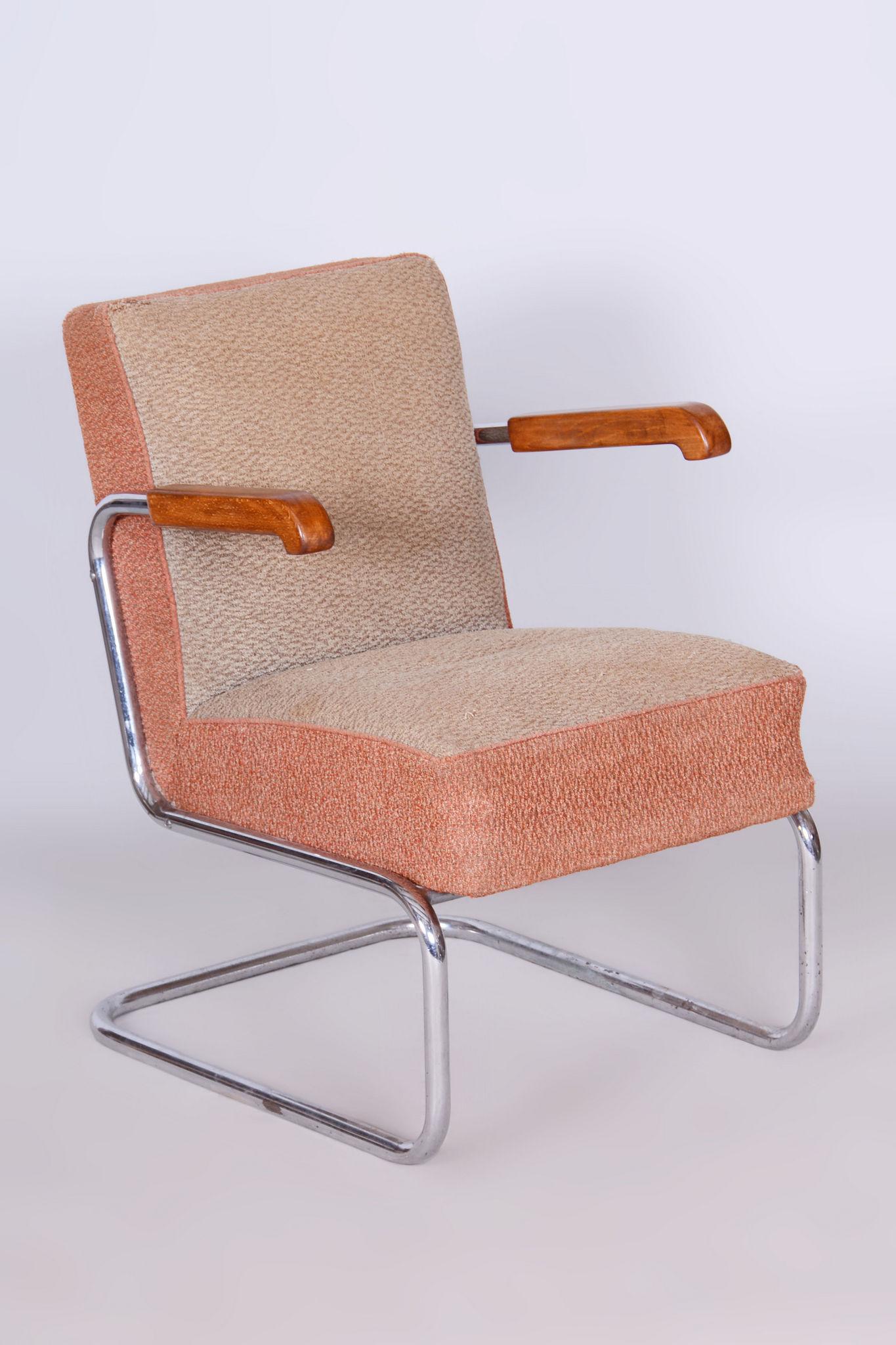 Made by Vichr & Co., a renowned Czech furniture manufacturer. 

In pristine original condition, the upholstery has been professionally cleaned, and its polish revived by our refurbishing team in Czechia. 

The chrome parts have been cleaned and