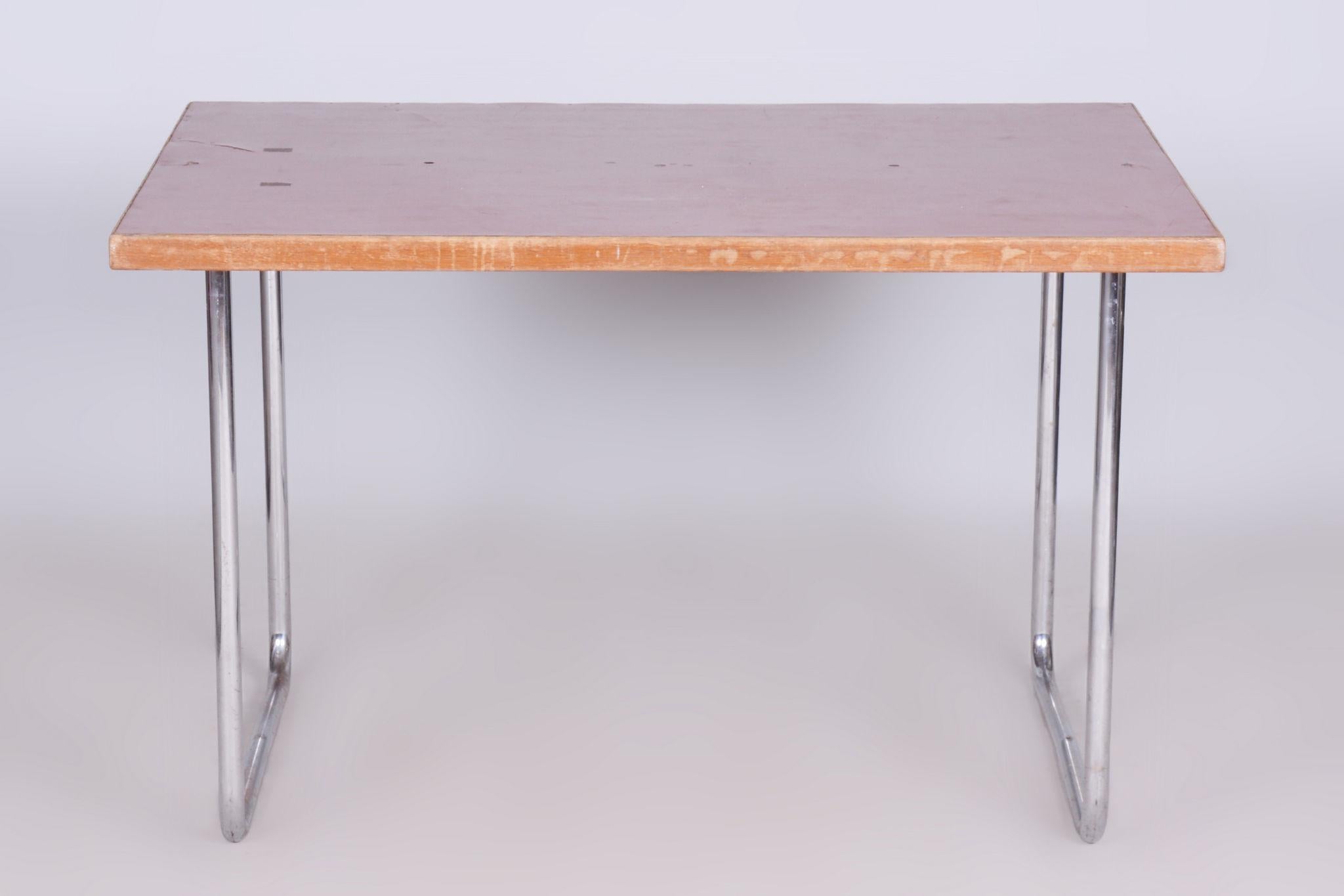 Original Bauhaus dining table.

Period: 1930-1939
Source: Czechia
Material: Chrome-Plated Steel, Spruce wood, Marmoleum 

Original well preserved condition.

In pristine original condition, the item has been professionally cleaned, and its polish