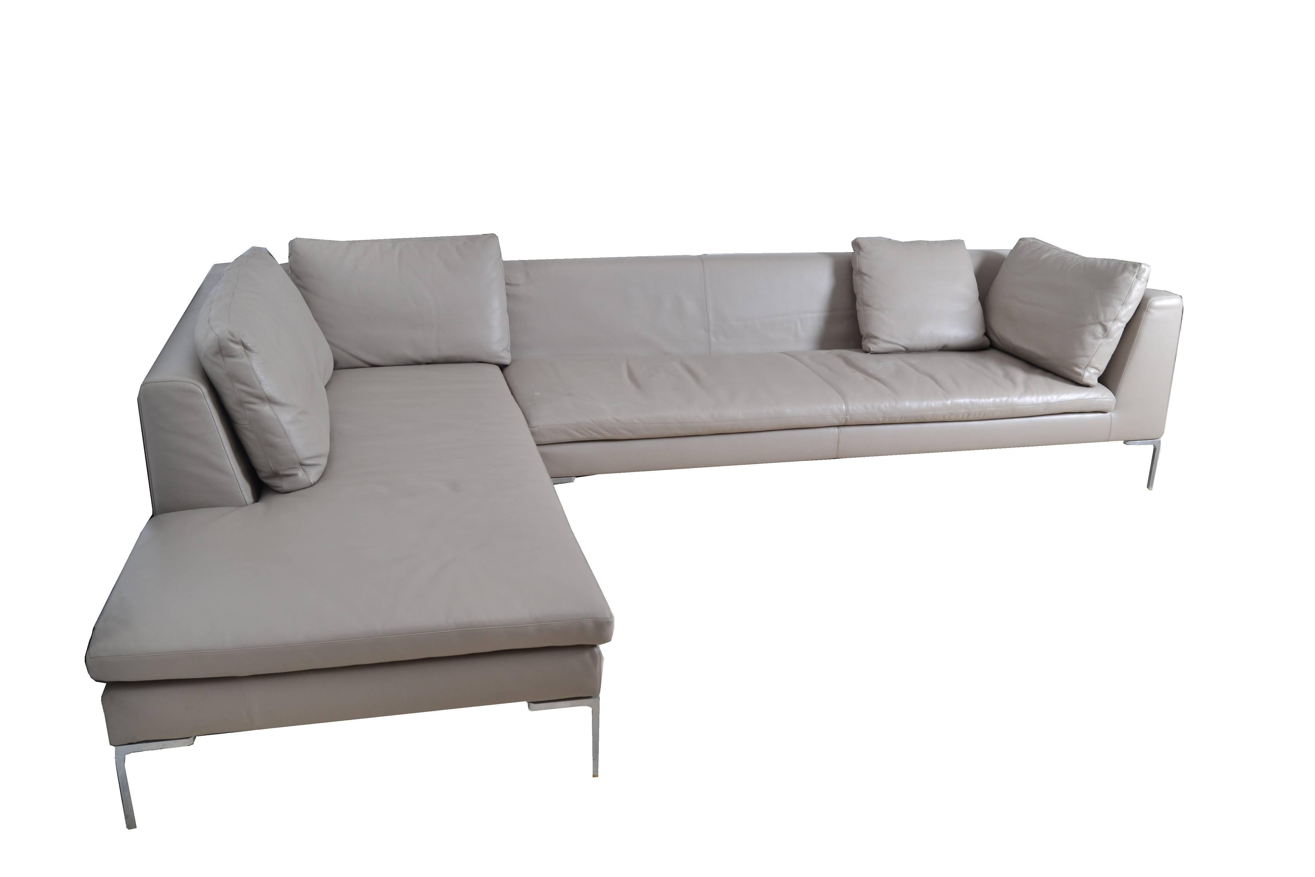 Original B&B Italia leather sectional sofa from the Maxalto collection. Model: Lucrezia, grey. This sofa consists of two sections. One straight and one chaise. Sits on die-cast aluminum Frame.
Dimension smaller section:
Depth 37.5 inches, length