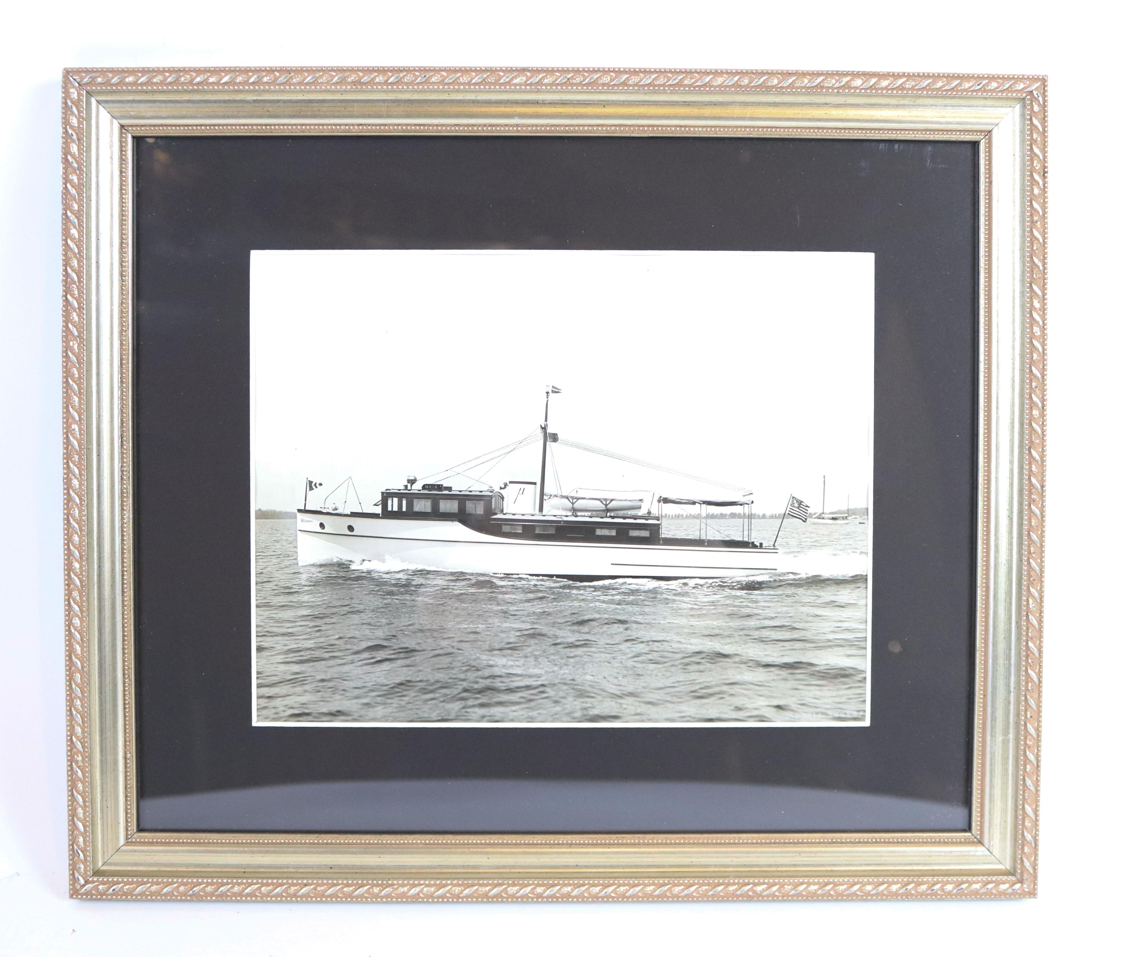 Original black and white press photo from the 1920s of Douglas Rigney's yacht MU-1. Matted and framed. 12 1/2 x 15. Rigney was vice president of A.H. Grebe, pioneers of radio broadcasting. The MU-1 is named for their station WMUR. She flew the