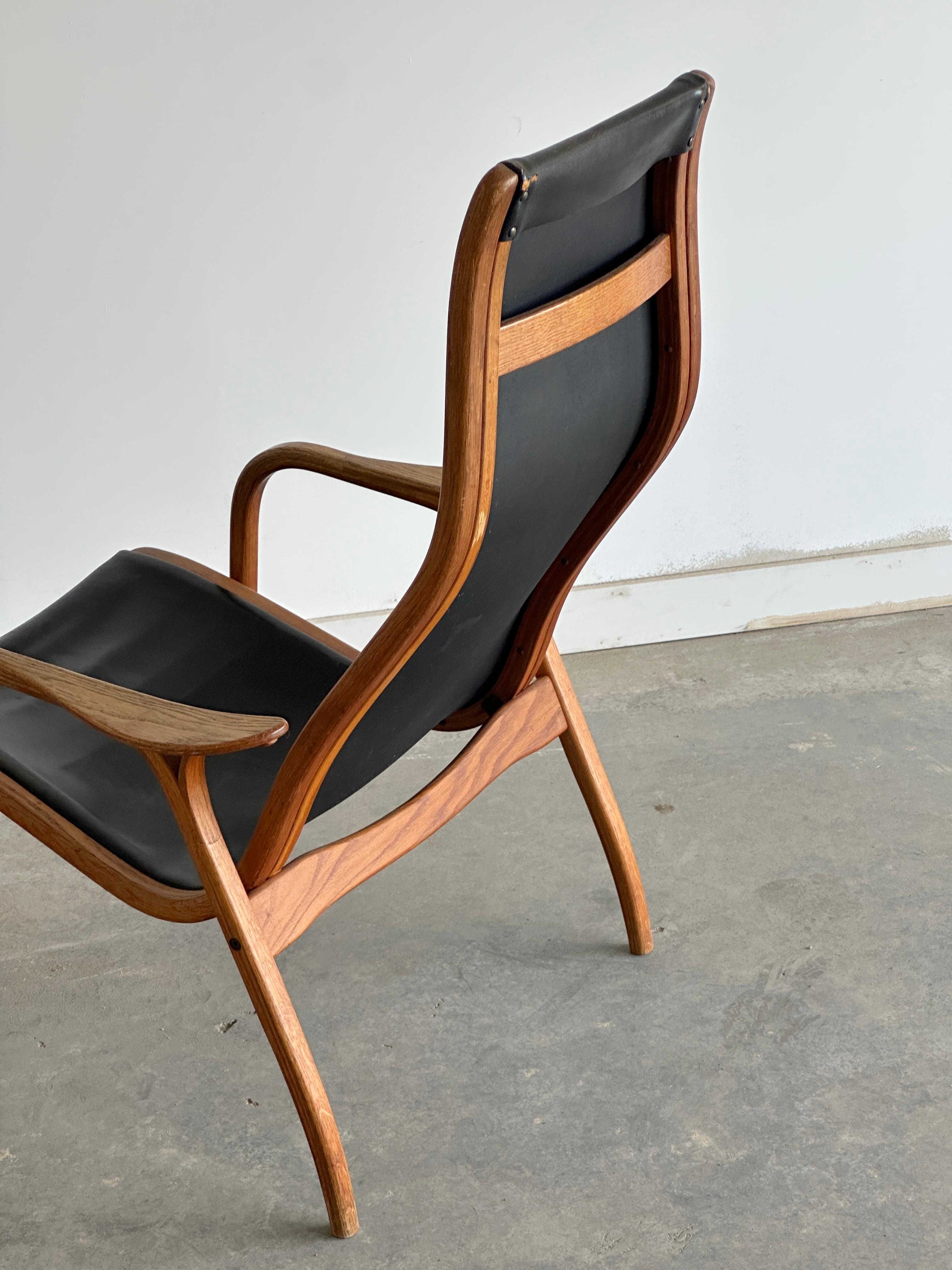 Mid-Century Modern Original black leather Lamino lounge chair by Yngve Ekström for Swedese For Sale