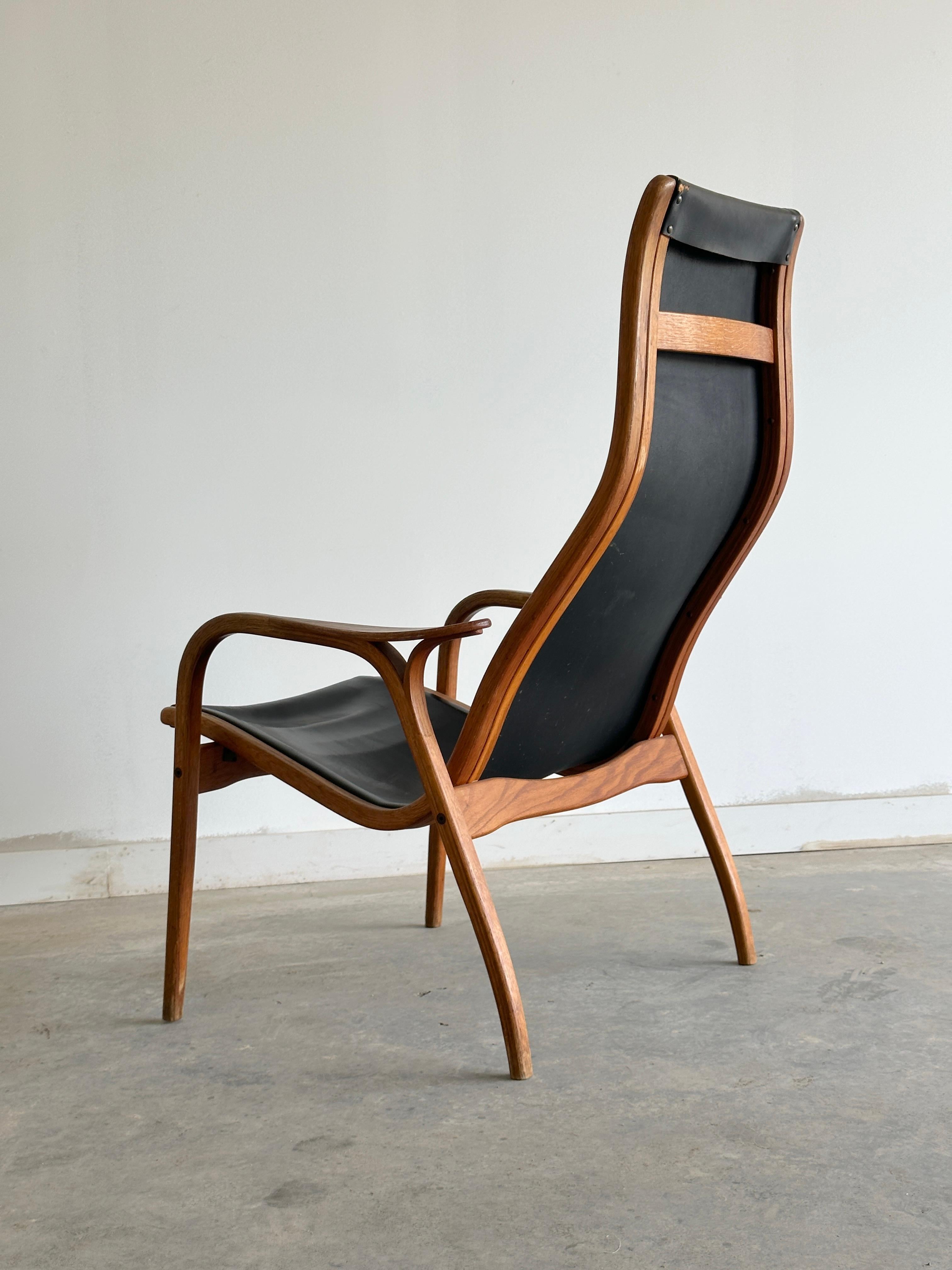 Original Lamino Lounge Chair aus schwarzem Leder von Yngve Ekström für Swedese im Zustand „Starke Gebrauchsspuren“ im Angebot in Kleinburg, ON