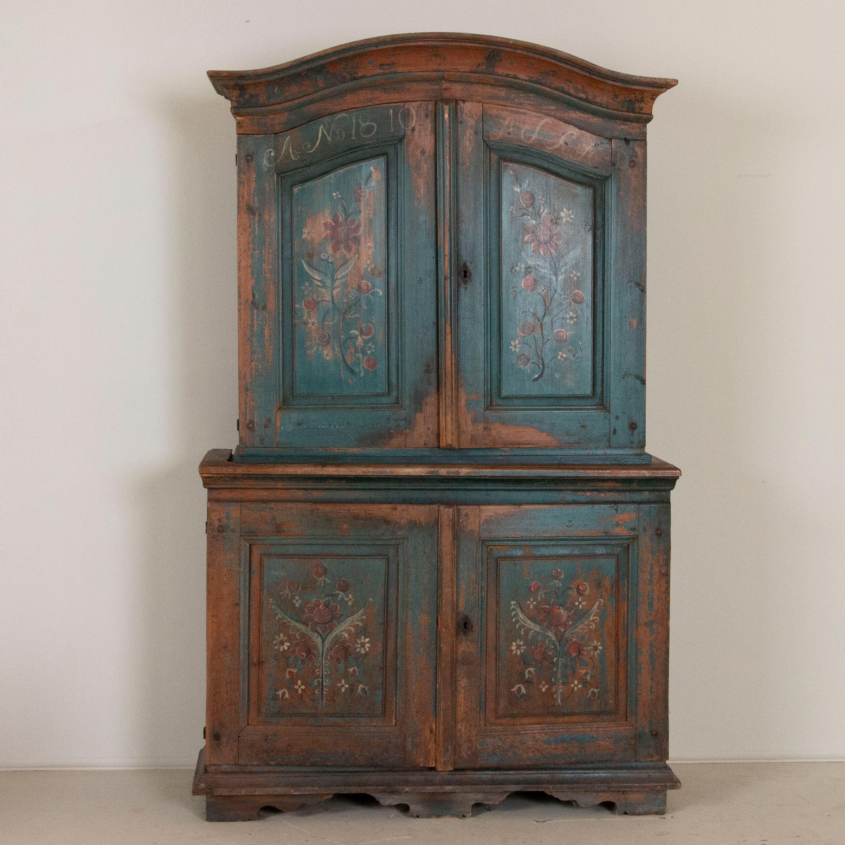 For those that appreciate the lovely hues of hand painted antiques from the Swedish countryside, this original blue painted cabinet is a special find. 
It has aged gently over the years, resulting in a softly distressed patina than only comes from