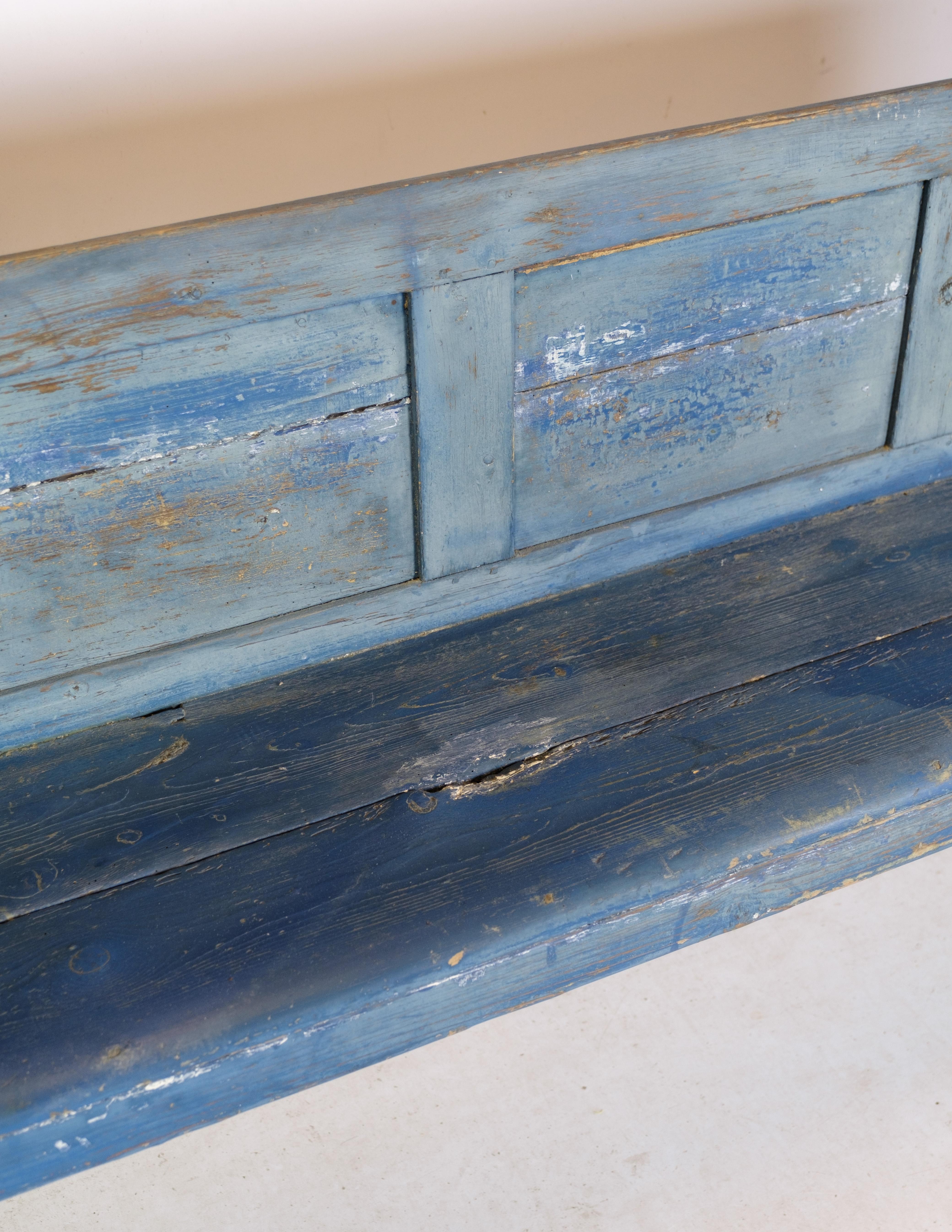 Bench in original blue painted color in pine from around the 1840s.
Dimensions in cm: H:84 W:202 D:37
