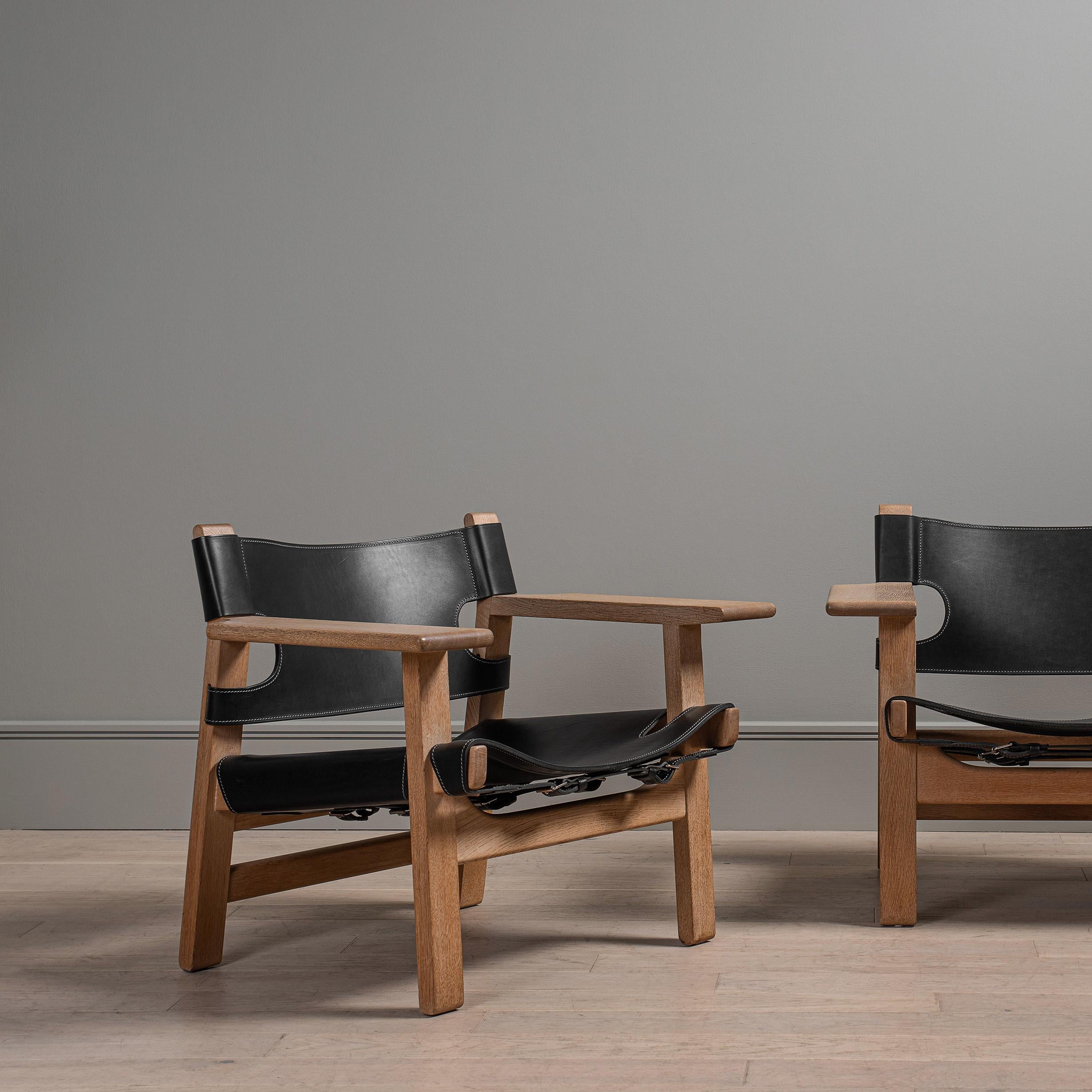 The Spanish chair by Borge Mogensen 1958. One of his greatest and widely acclaimed designs. These are the original versions from the Fredericia manufacturers, disernible by the early frame construction. Solid oak frame with original soap finish in