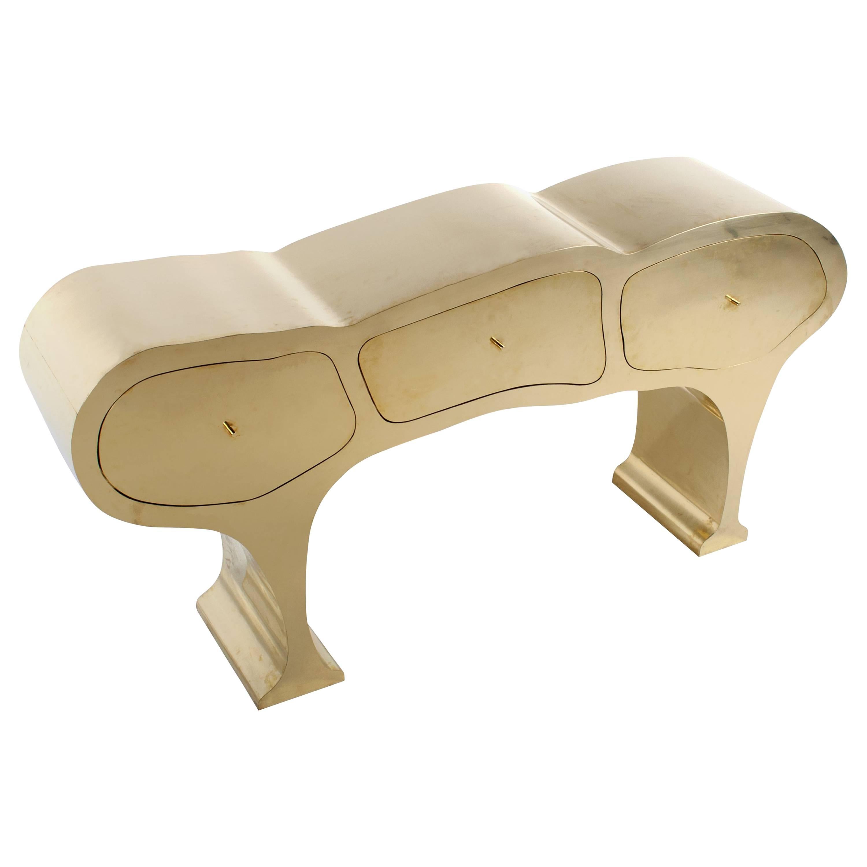 Brass or stainless steel cabinet.
Material: Wooden frame covered with brass.
Material: Welded and polished stainless steel.
Size: 200 x 95 x 42 cm.
Signed by Werner Neumann.

Werner Neumann, is an internationally recognized furniture designer