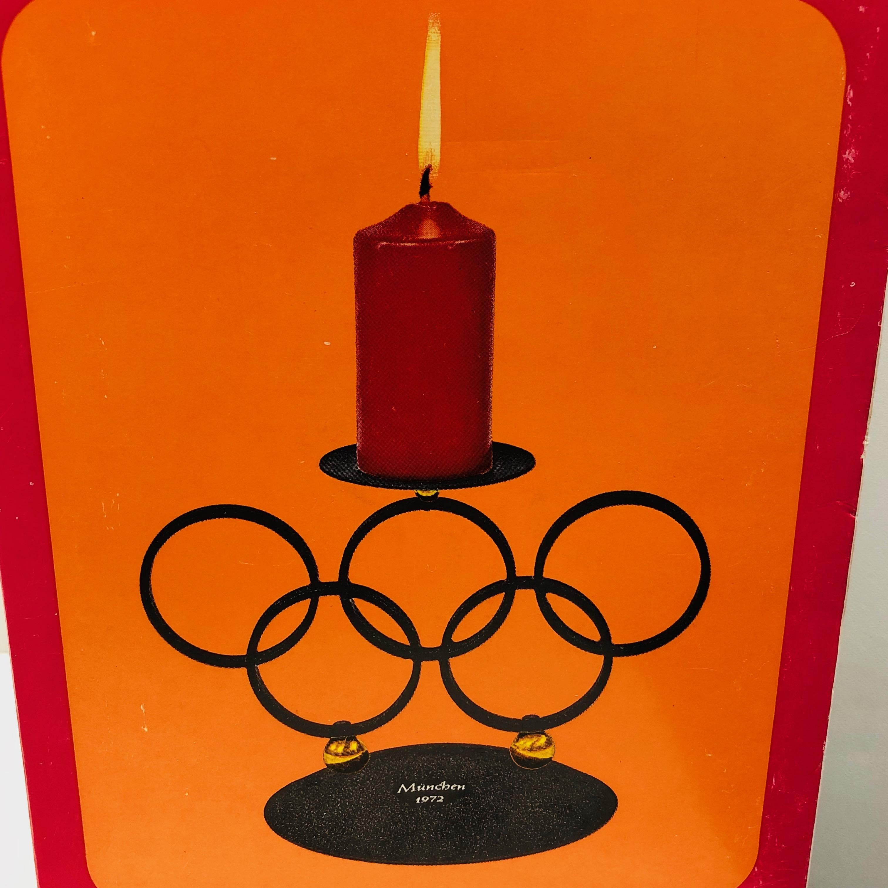 This is a 1972 candlestick made as souvenir for the 1972 Olympic Games in Munich, Germany. In an all original condition, never used, in original old box. Candles with some issues but this is old-age, also the screws with some rust. All other parts
