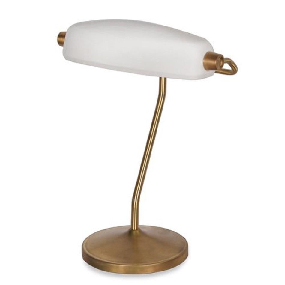 A modern take on the 20th century classic, this contemporary pair of Banker's lamps are a truly stunning addition to any room.

Features a handmade bone china shade, and precision-machined brass details deliver timeless style and