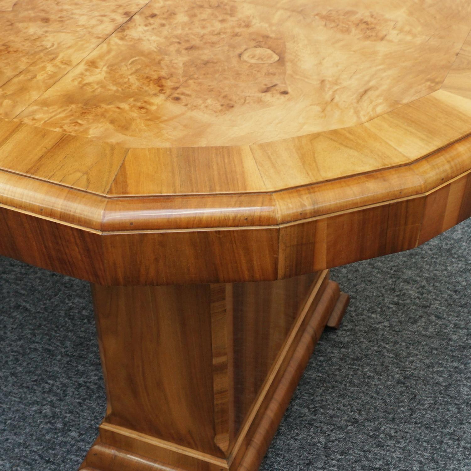 An Art Deco dining table. Burr walnut veneered table top with figured walnut banding over stepped burr walnut veneered pedestals. 

Dimensions: H 76cm W 97cm L 190cm 

Origin: English

Date: Circa 1930

Item Number: 1110222

All of our