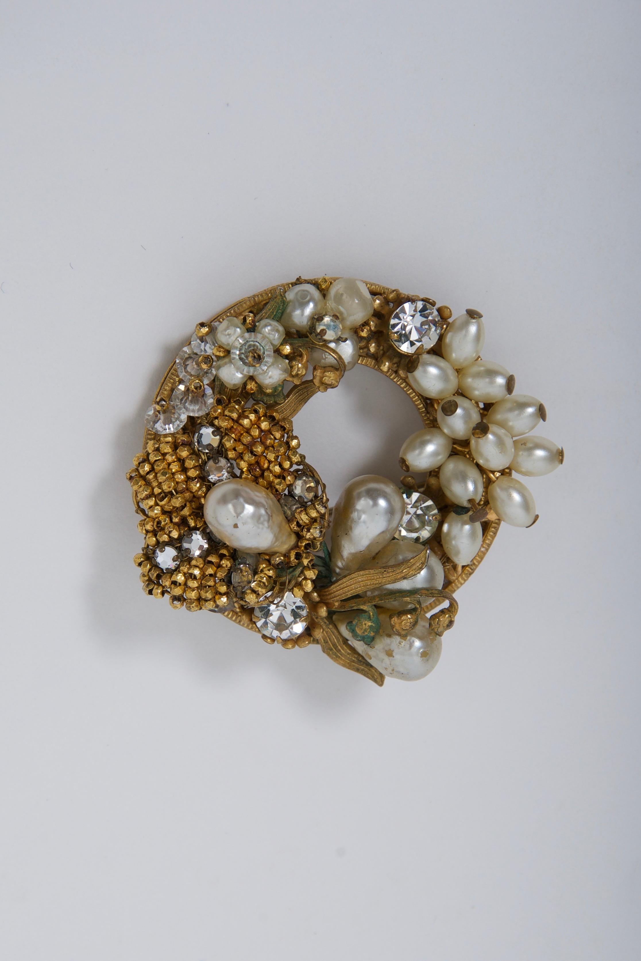Wreath-shaped brooch of various pearls, rhinestones, crystals, and micro gold beads by Robert, c.1960. Hook in addition to pin, so can be worn as pendant. Some of the Original by Robert pieces were similar to that of Miriam Haskell and De Mario, as