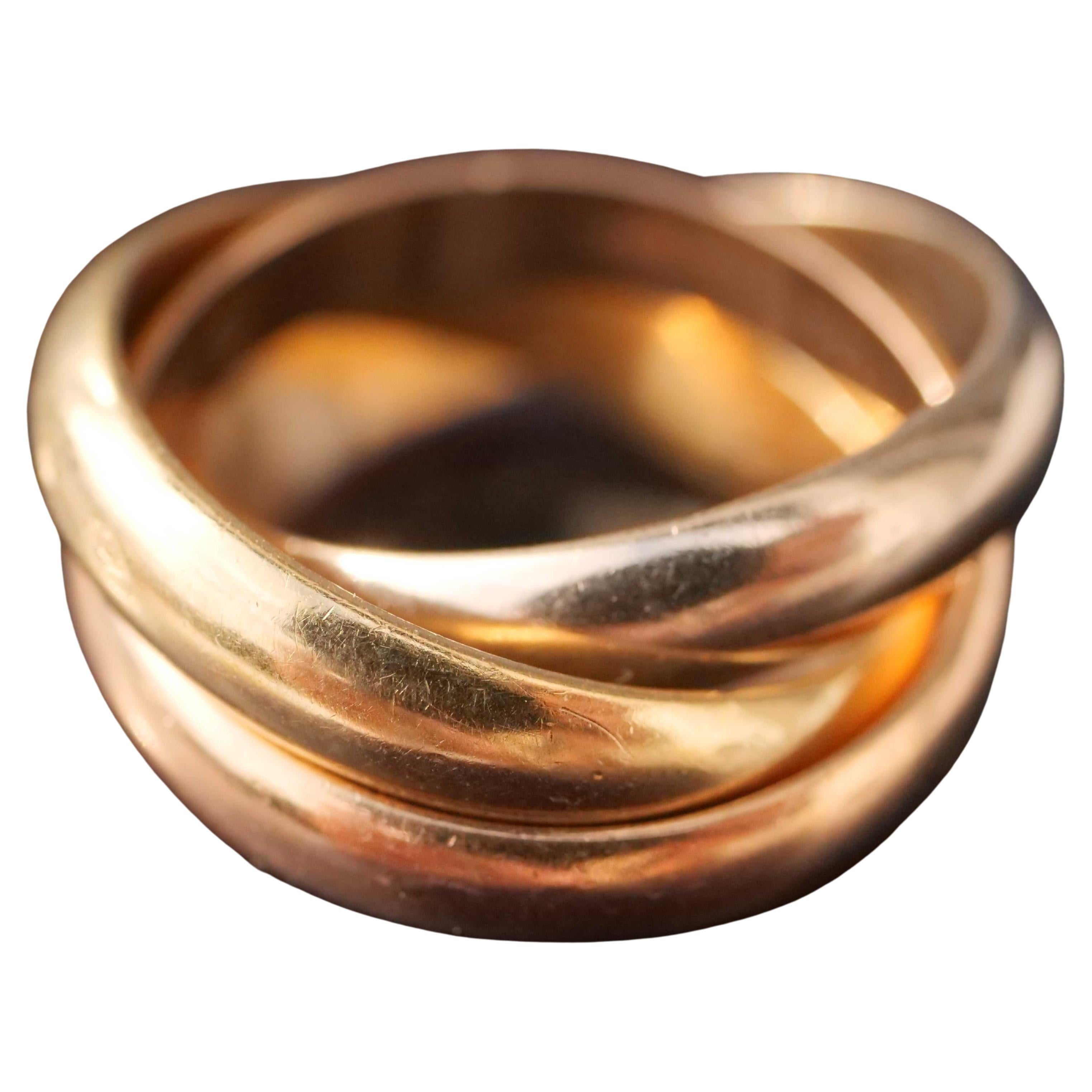 Original Cartier Ring Trinity in 750 white gold yellow gold rose gold, triple intertwined band ring, approx. 11.25 grams heavy, timeless design, inside there are the original hallmarks P2368B, ring width 51 (16.2 mm), width 4 mm height, Worn