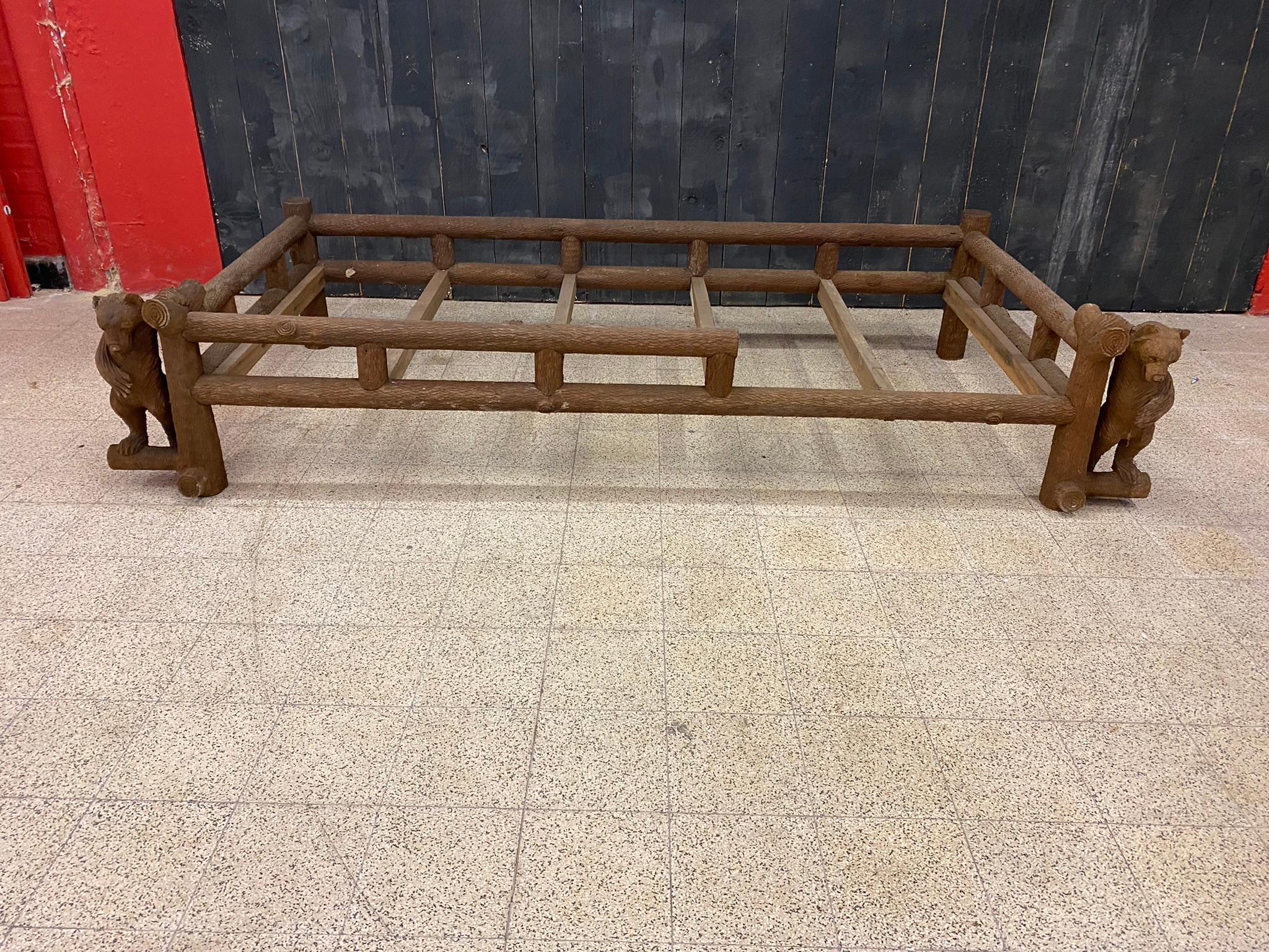 Original carved wooden daybed or bed, decorated with bears circa 1980.