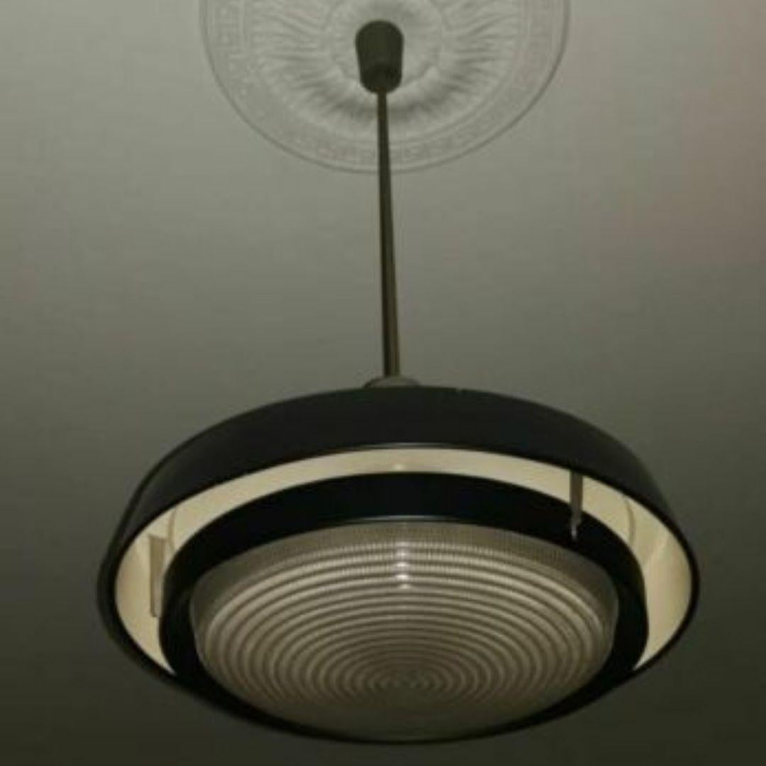 original design chandelier from the 70s, probable Westinghouse, Artemide or Bruno Gatta production, characterized by a black lacquered metal parabola with aluminum elements 

It measures about 1 meter in height, diameter about 50 cm (... ask if