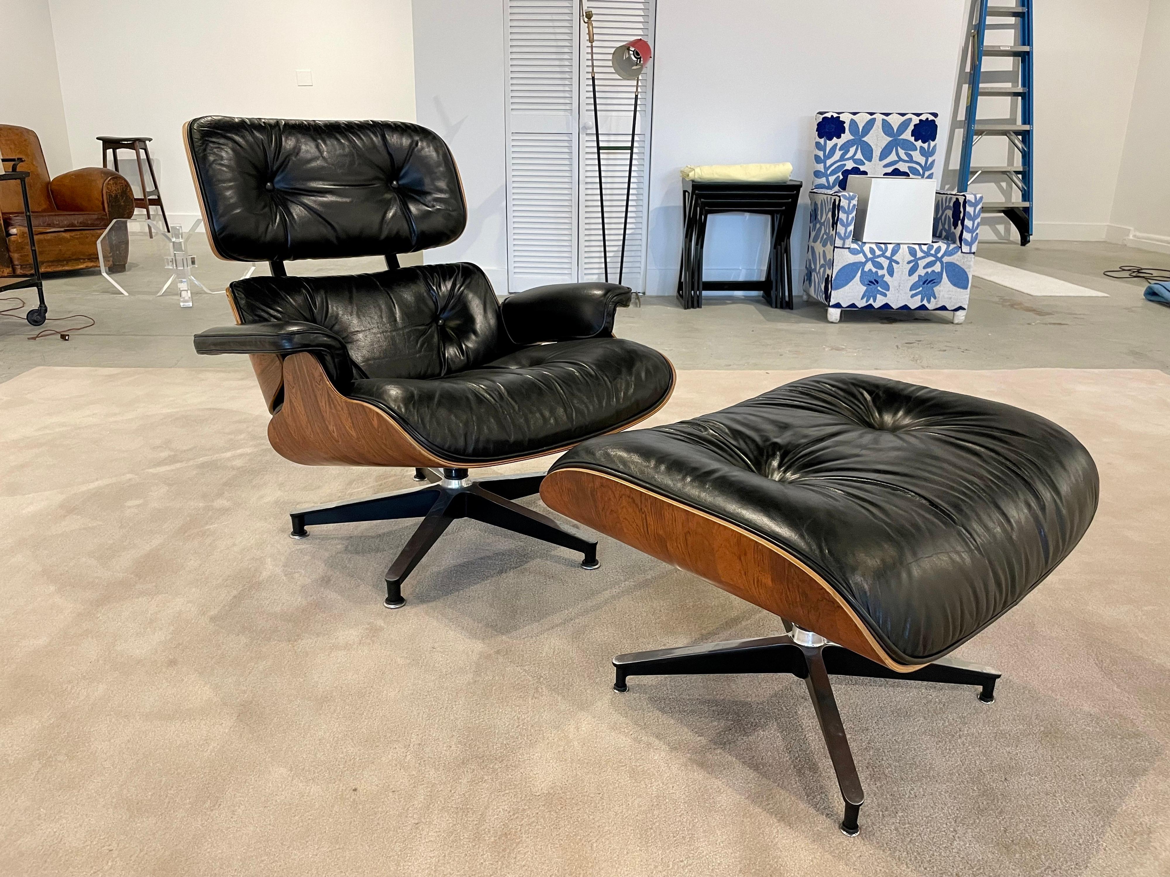 ALL vintage and professionally restored 2nd edition of the iconic Eames Lounge Chair + Ottoman. As elegant as it is comfortable, this lounge chair is a piece emblematic of 20th century design. Original black leather and Brazilian rosewood. Leather