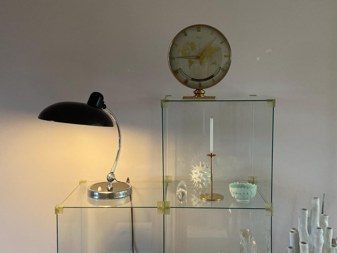 Christian dell desk lamp model 6631 Luxus / president for Kaiser Idell, Germany. Arm and rim chromed metal, shade and base black painted metal. Arm and shade adjustable. With E26/27 Edison screw socket. Very nice condition and ready to use with 110