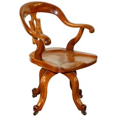 Fauteuil de directeur de bureau sculptural en noyer massif d'origine, datant d'environ 1860