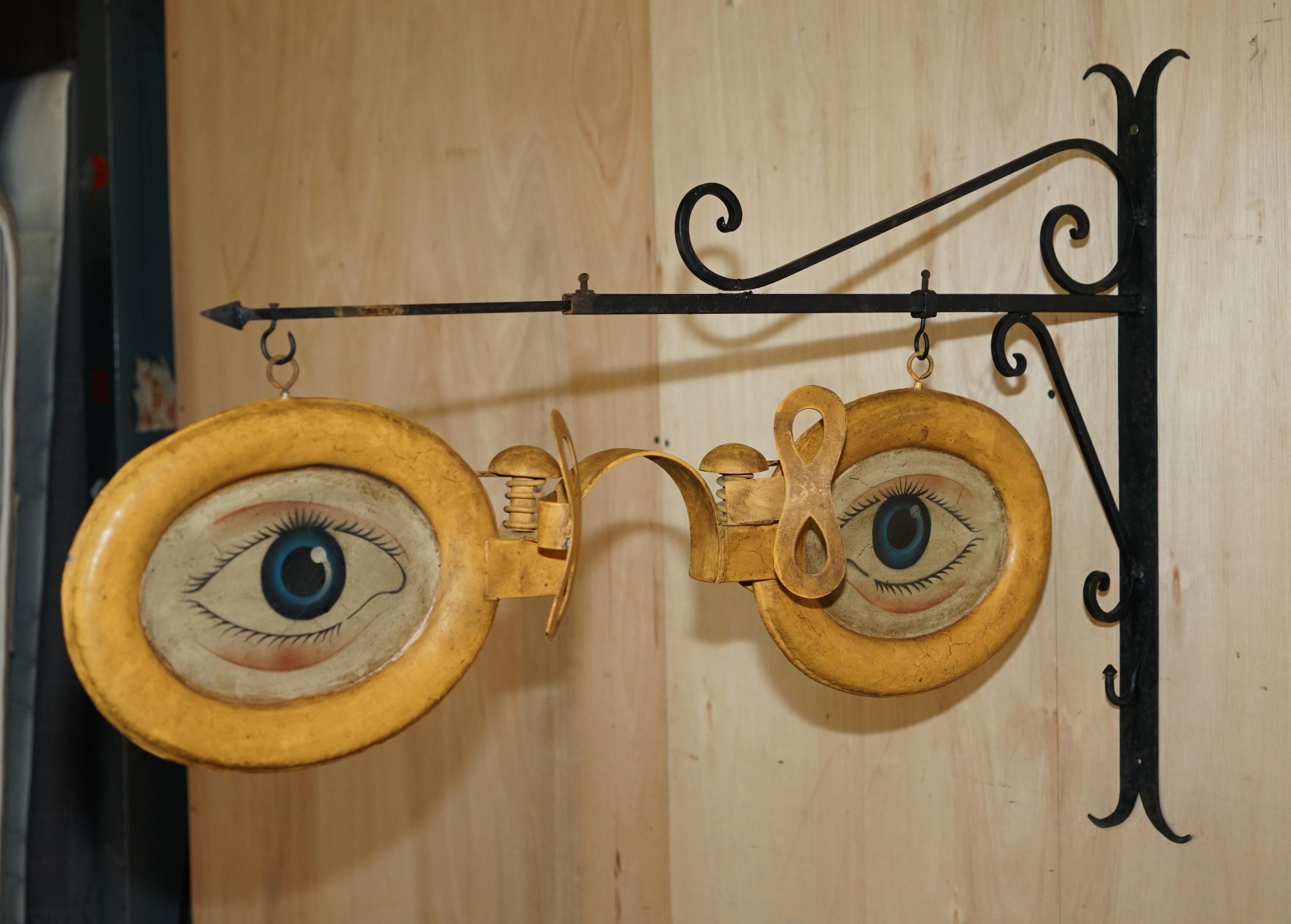 Early 20th Century ORIGINAL CIRCA 1900-1920 OPTICIANS ADVERTISING SiGN WITH ORIGINAL PAINT & MOUNT For Sale