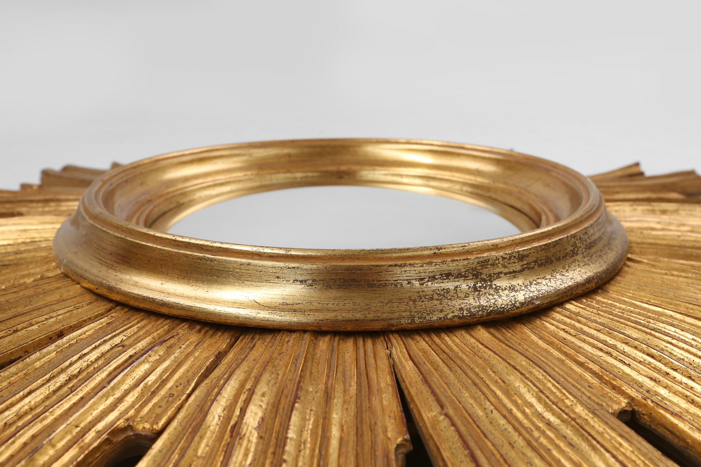 French Original classic gilt wooden sunburst mirror, France ca. 1970