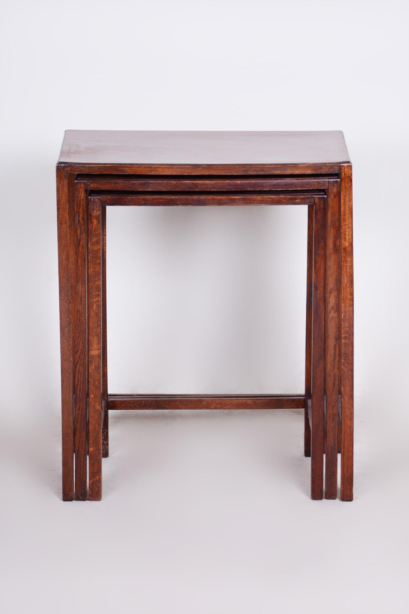 Beautiful brown nest tables made in the 1960s, they are made out of wood
Made by Halabala.