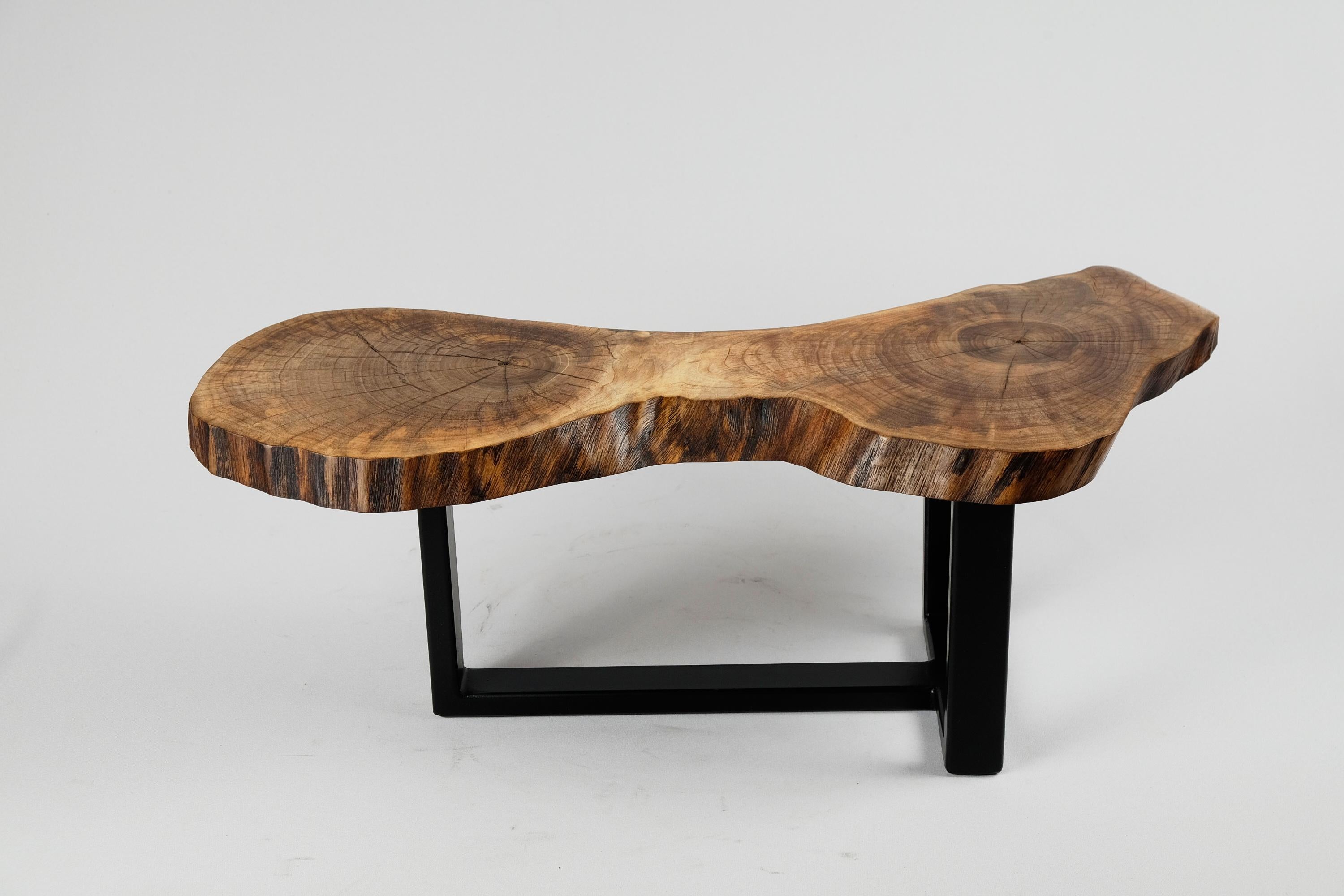 Unique and decorative side table. It is build in combination of walnut wood & steel, and protected with the highest quality oils, ensuring durability for generations. Such unique handmade design will highlight your interior and bring comfort to your