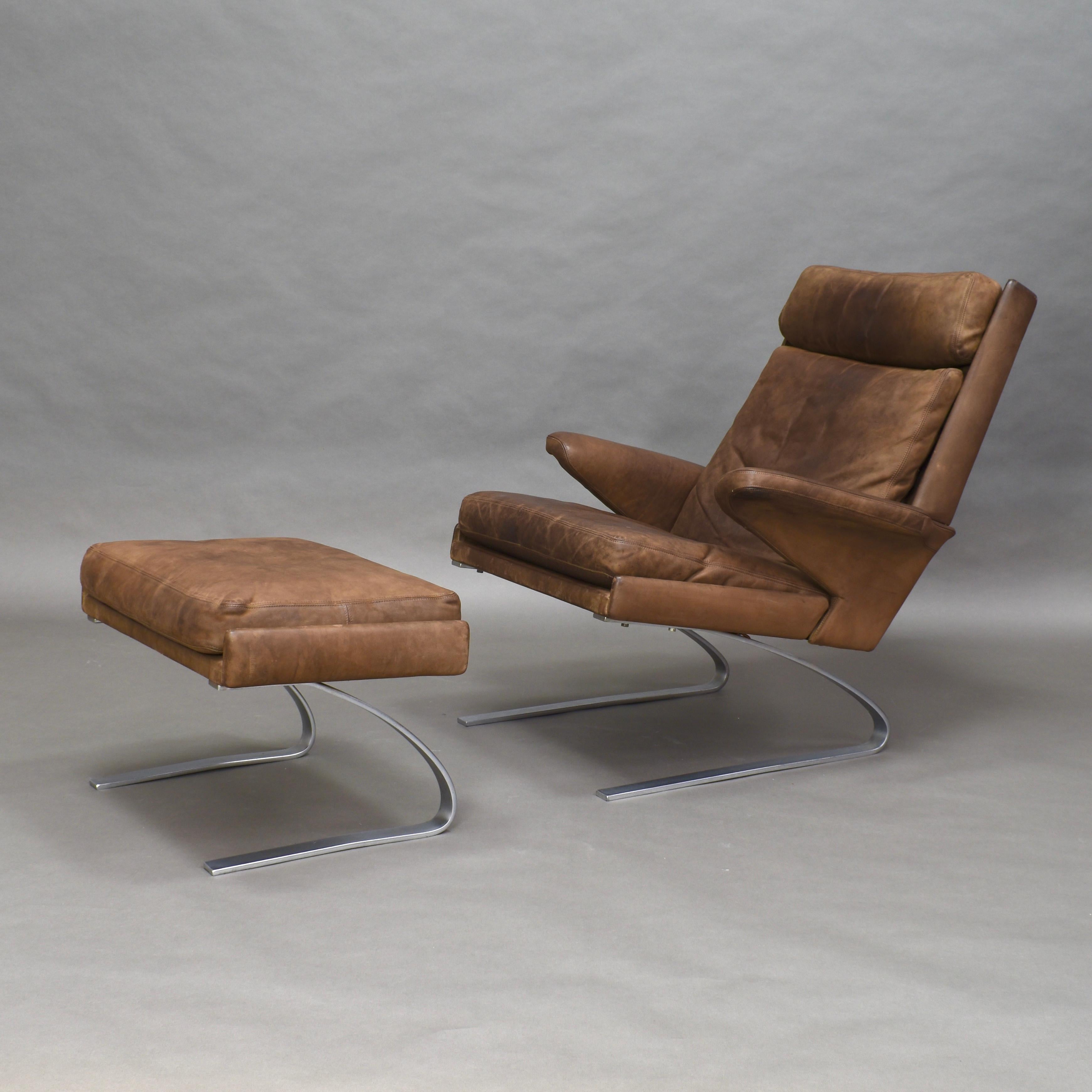 Rare full leather lounge chair and ottoman by Reinhold Adolf & Hans-Jürgen Schröpfer for COR – Germany, 1976, still in original condition.

The set still remains in original condition. The leather shows stains of use but the leather has been