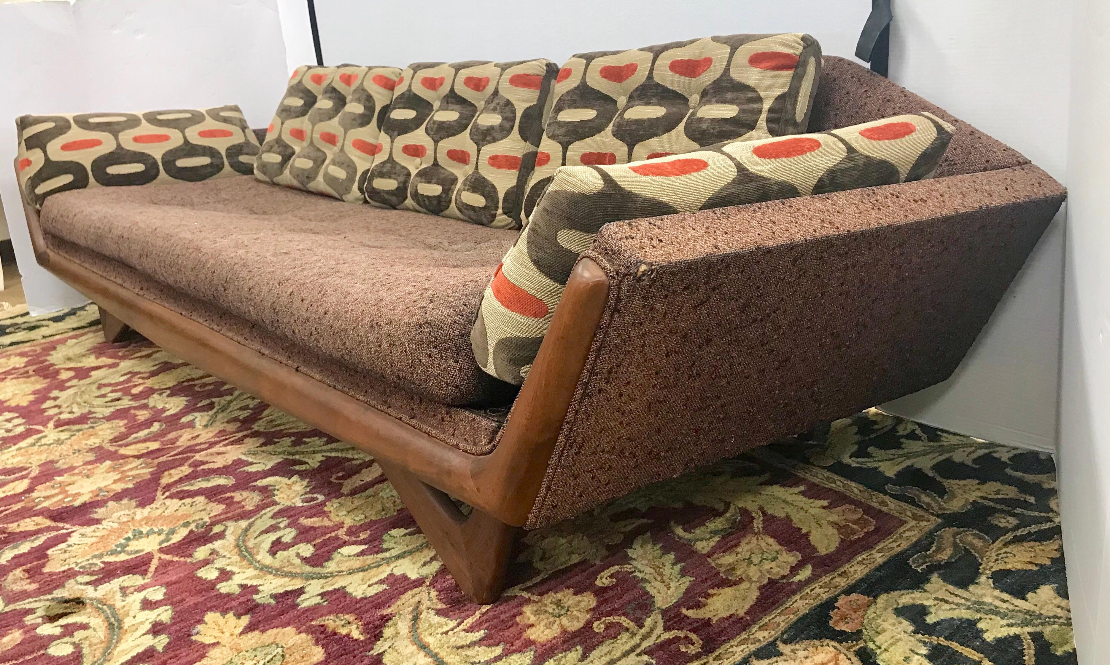 Magnificent signed Craft Associates original Adrian Pearsall Gondola sofa. All walnut body has been refurbished including joints, legs and frame. Fabric is original and is in fair condition, except new
upholstery on the back cushions and side