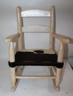 Original Cream Painted Child's Rocking Chair with Cow Skin Seat