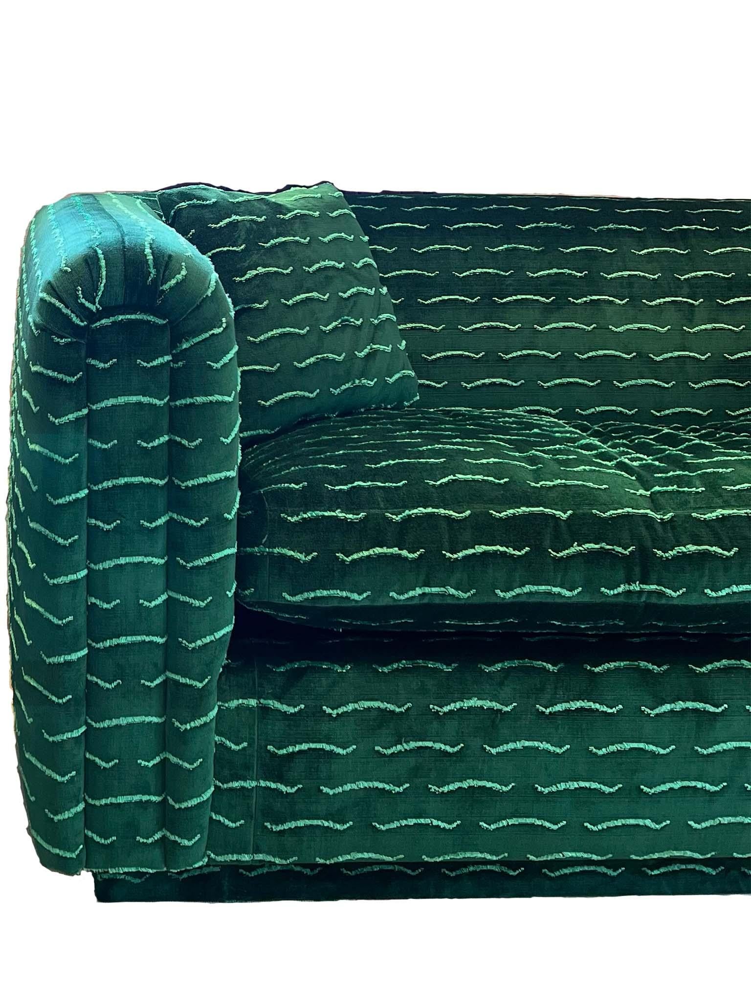 Charming custom made mid-century style settee in Dedar Milano fabric Nouvelles Vagues. Crafted with comfort and style in mind, this couch is a one of a kind piece designed by the team at Cafiero Select. The settee has been custom upholstered in