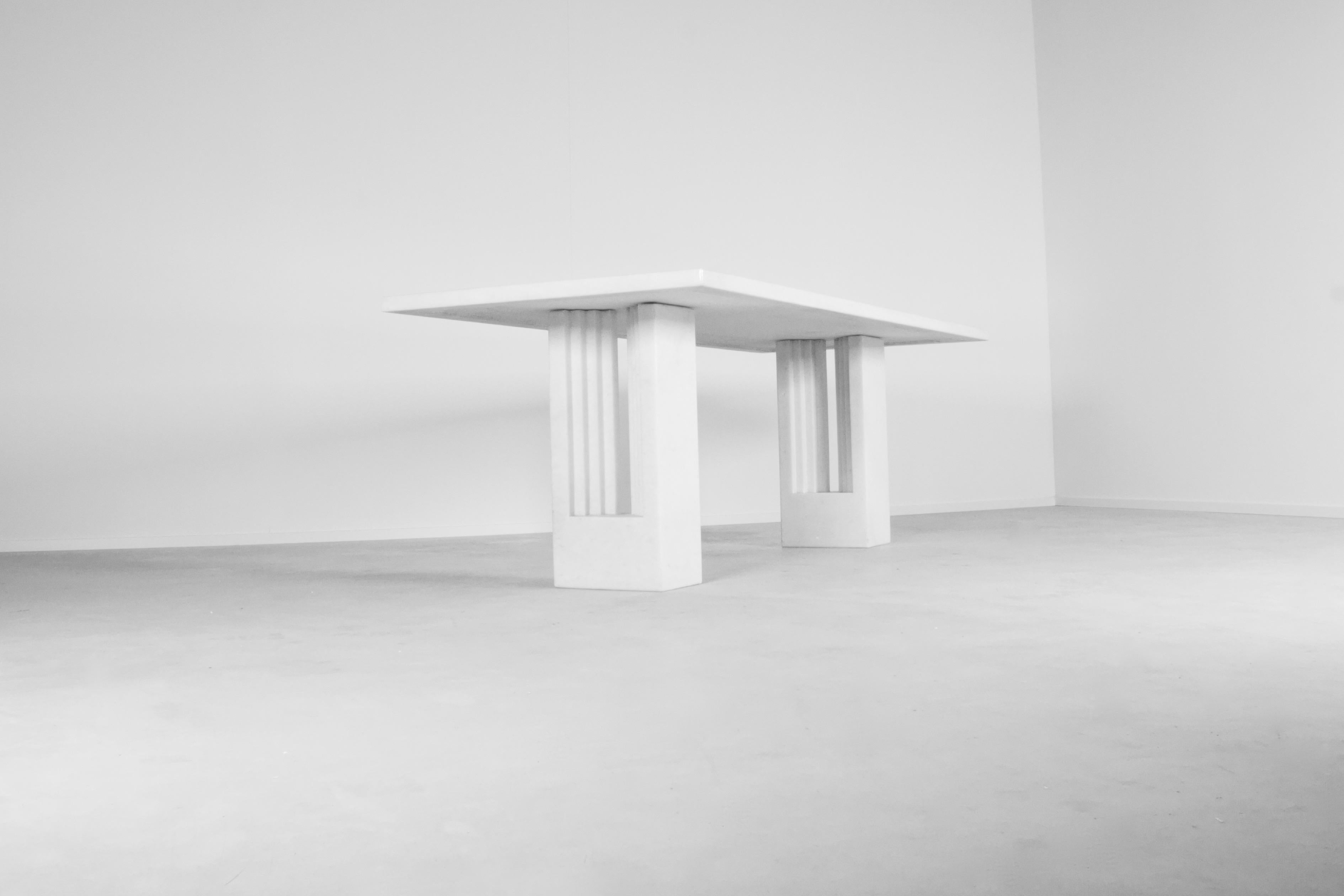Original Delfi table in very good condition.

Manufactured by Gavina, Italy

Designed by Carlo Scarpa and Marcel Breuer

This particular table is made in a rare Bianco Cristallino marble with silver chips (See close up image) 
As far as we know this