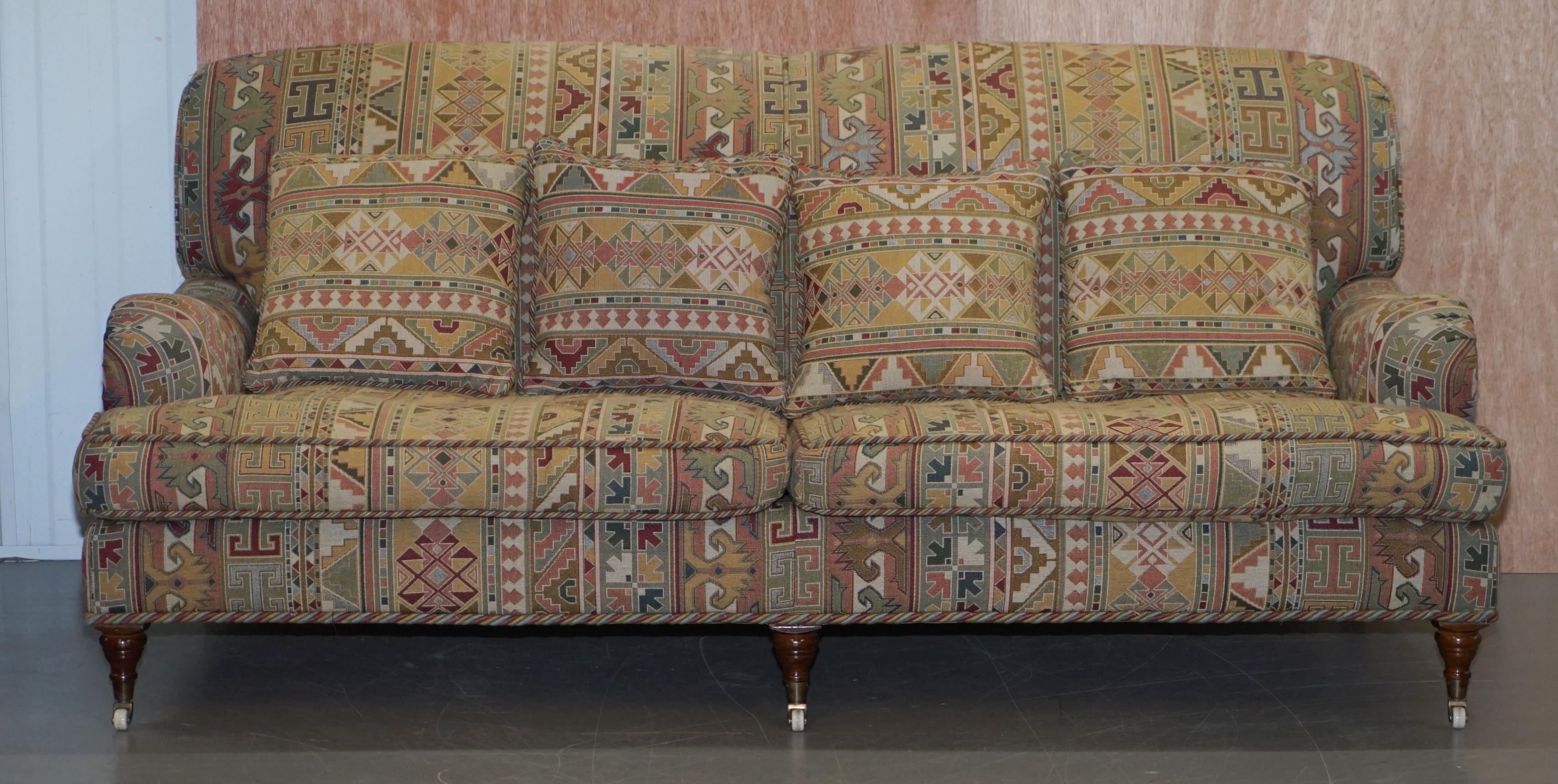 We are delighted to offer for sale this lovely handmade in England Derwent Kilim pattern upholstery Howard sofa

A very good looking decorative and well made piece. The sofa was made by Derwent and it is of course a Howard style with the lovely