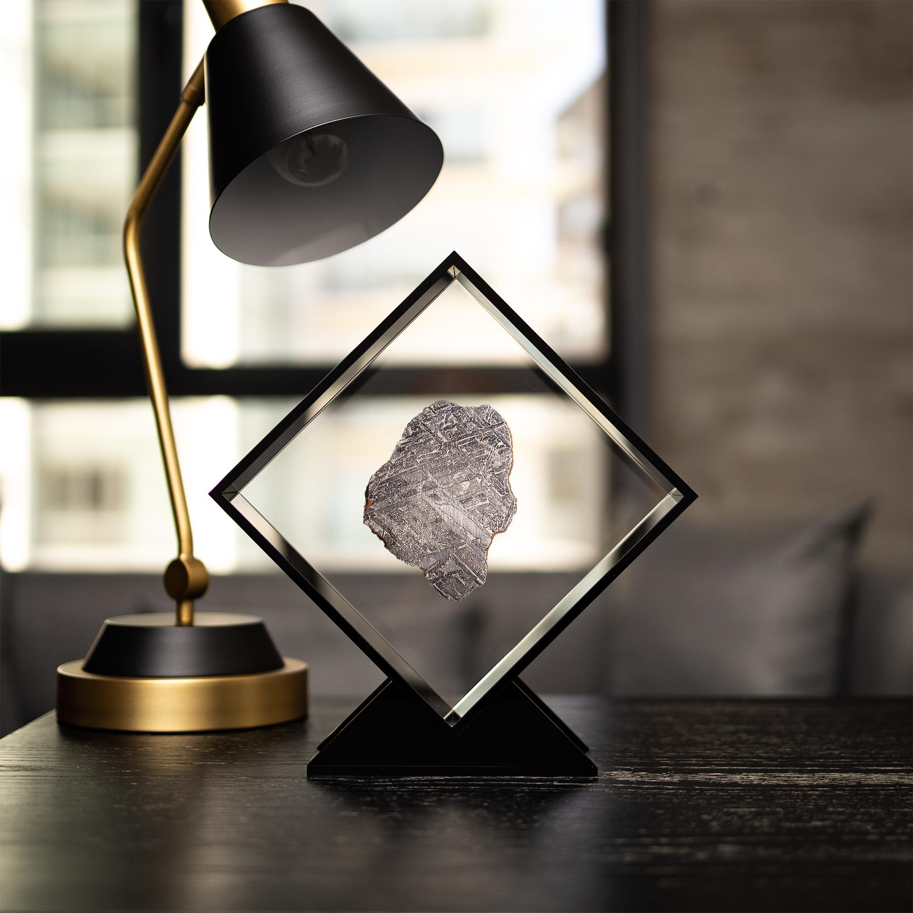 Original design in Acrylic display with a magnet making the Meteorite look as it´s floating the same way it did in outer space for years before its final visit to Earth. 
Seymchan Meteorite 
Origin: Magadan Oblast, Russia
Classification: