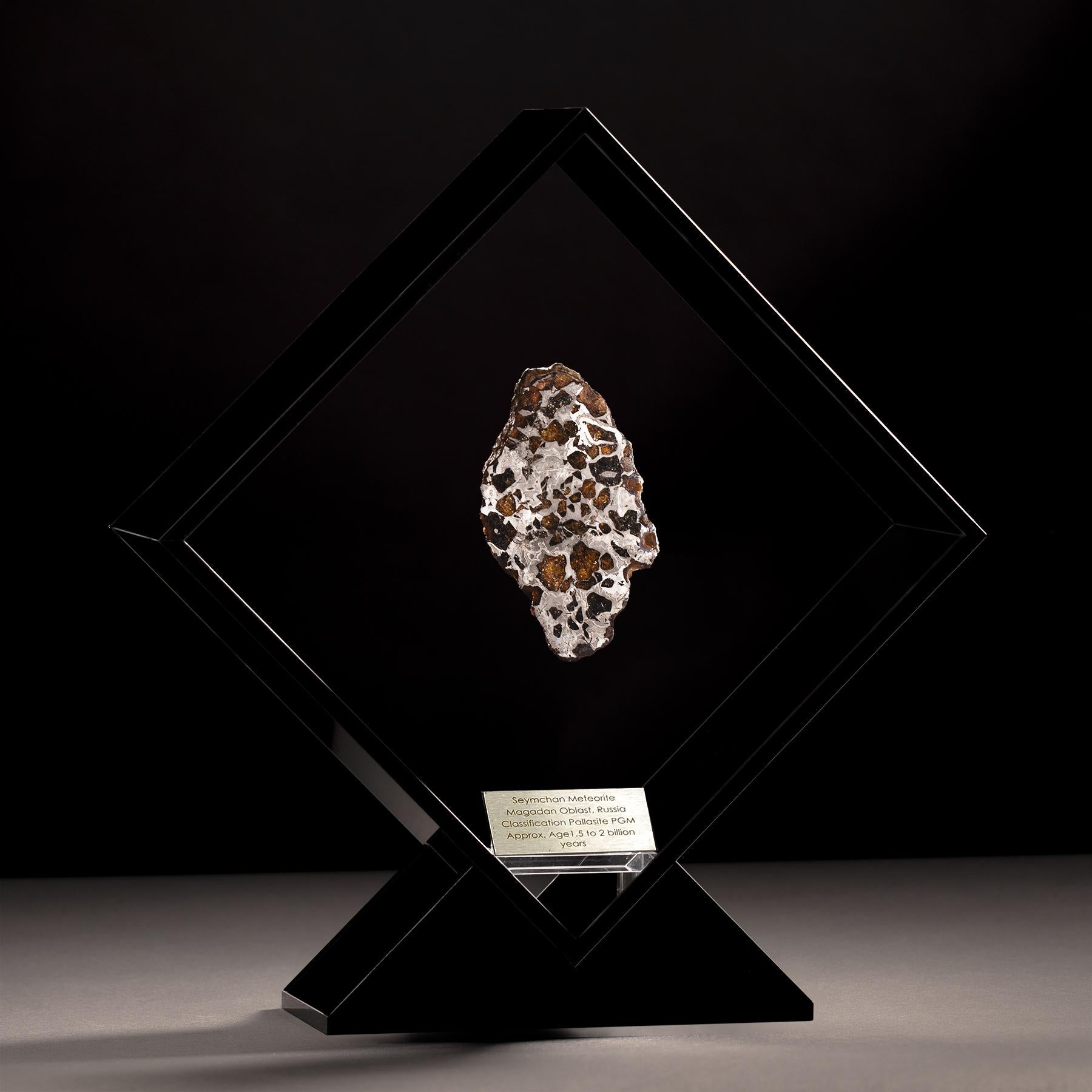 Mexican Original Design, Seymchan with Ovaline Meteorite in a Black Acrylic Display