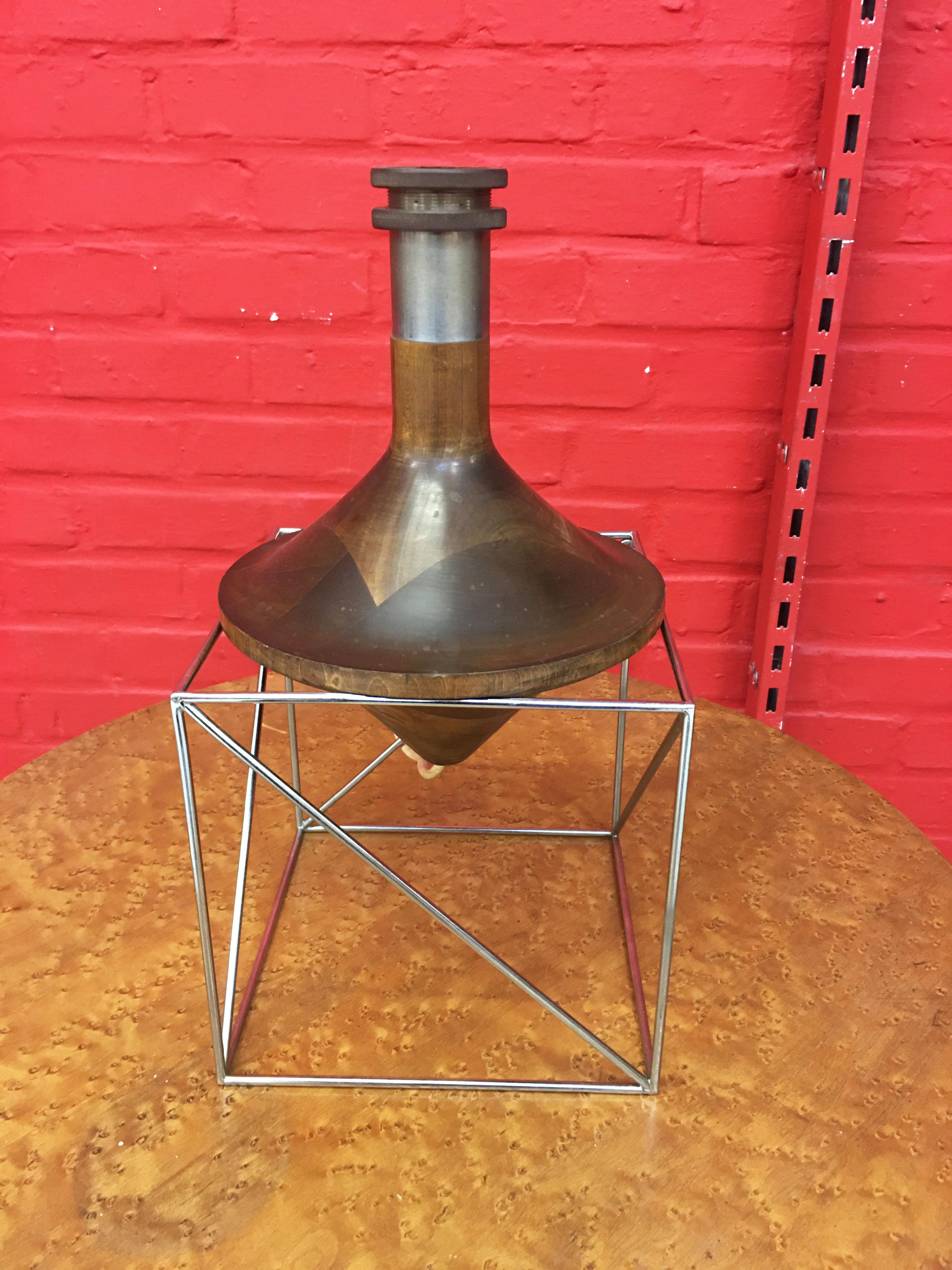 Original diabolo lamp in the style of Max Sauzé, circa 1960
assembly of different woods for the diabolo, which rests on a chrome metal structure.