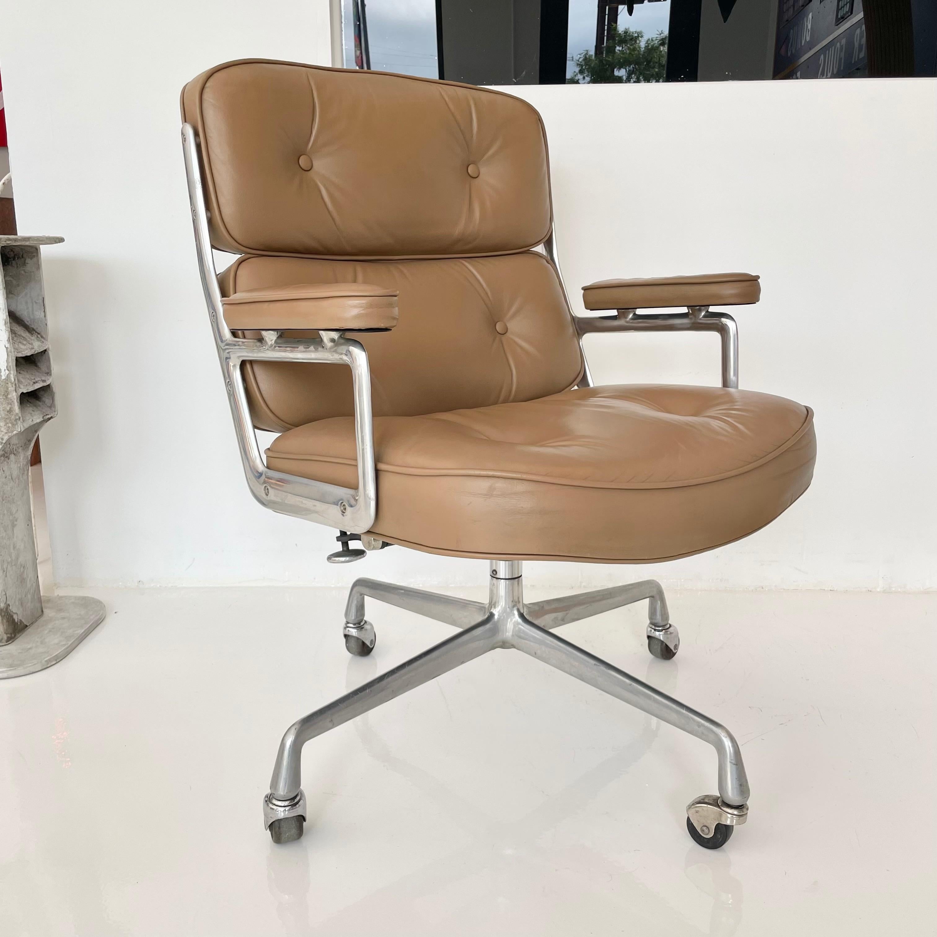 Classic Eames Time Life swivel chair in camel leather for Herman Miller. Swivels, reclines, and is height adjustable. Unusual color. Metal and leather are in good vintage condition with wear as shown. Offered with original casters. The perfect
