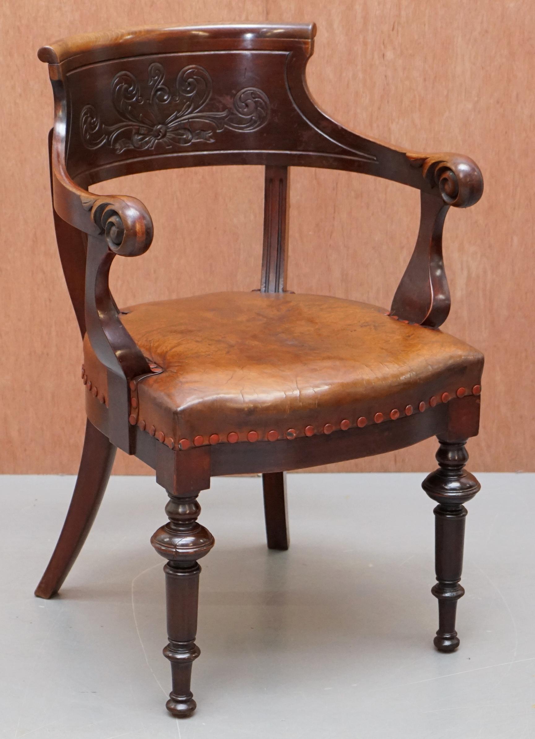 We are delighted to this lovely original circa 1840 handmade in England, mahogany with brown leather upholstery captain’s office chair.

A very good looking well-made and decorative office, library or study armchair. Made in solid mahogany,