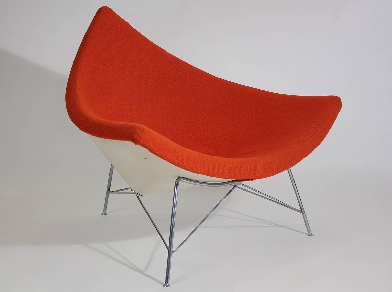 Rare original early version George Nelson coconut chair, circa late 1950s. Pretty sure this is the second version and has a metal shell. Later the chairs shelf were made in fiberglass. This chair was reupholstered in Knoll fabric several years ago