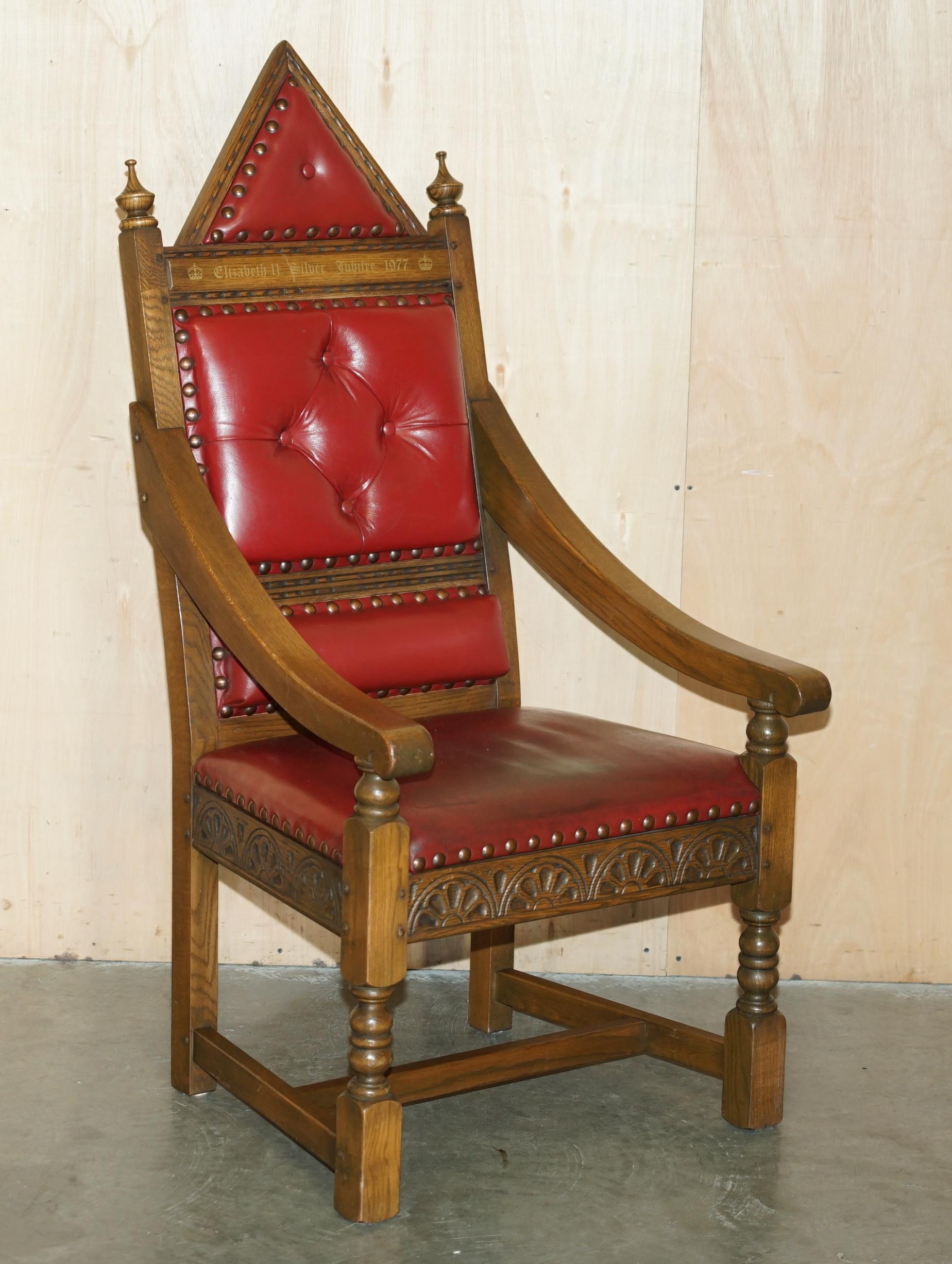 Royal House Antiques

Royal House Antiques is delighted to offer for sale this stunning original Elizabeth II Silver Jubilee English Oak and Ox Blood leather throne armchair

Please note the delivery fee listed is just a guide, it covers within the