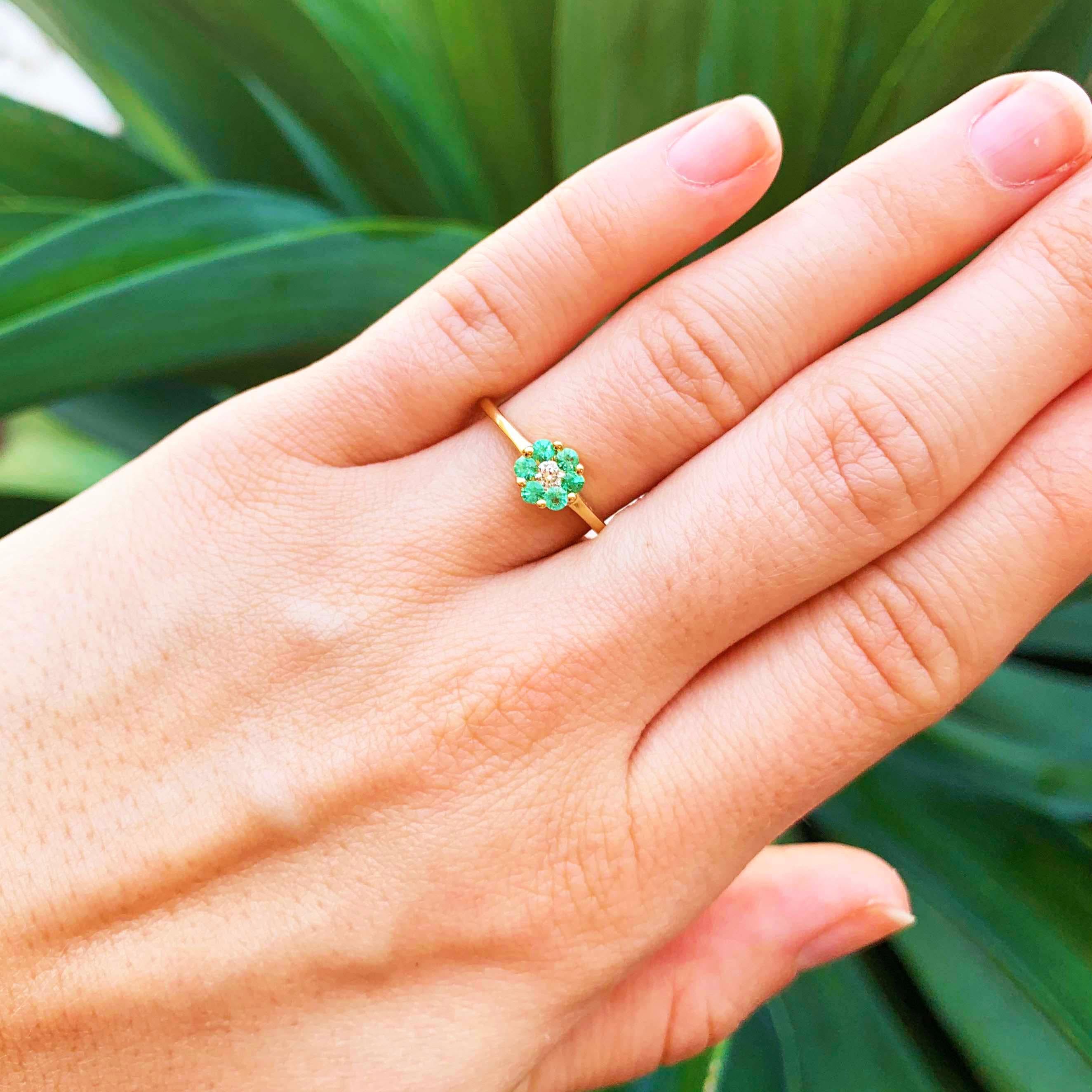 The precious genuine emerald and natural diamond ring is a May birthstone ring with all genuine gemstones and precious metal! The emerald and diamond flower ring has a flower design that is made with genuine, natural round emerald 