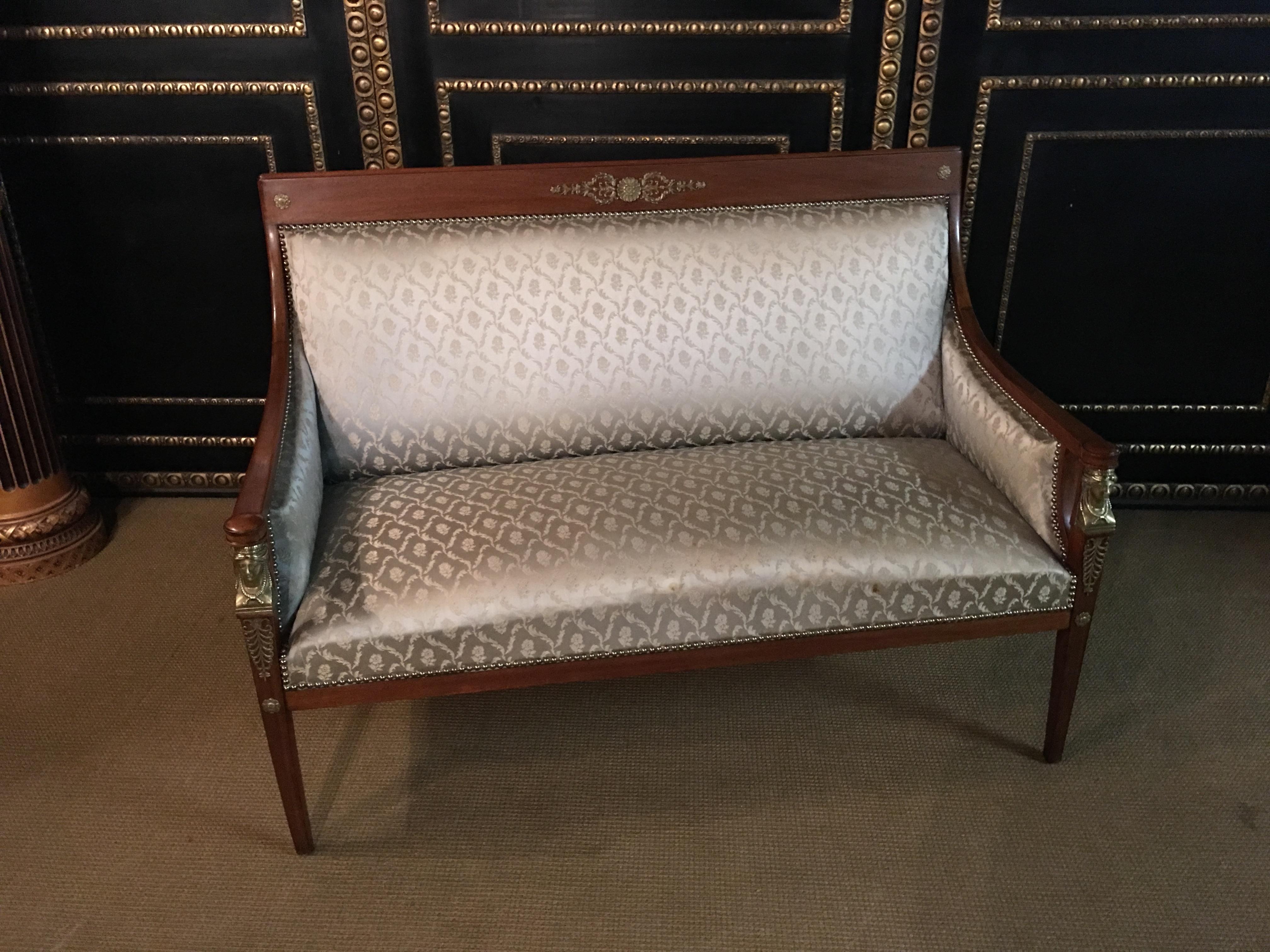 Original Empire sofa circa 1860-1870 from an Empire room.
Massive mahogany cast with Empire caryadites bronze.
top condition.

Measurments:
Breite: 140cm
Höhe: 100cm
Tiefe: 80.